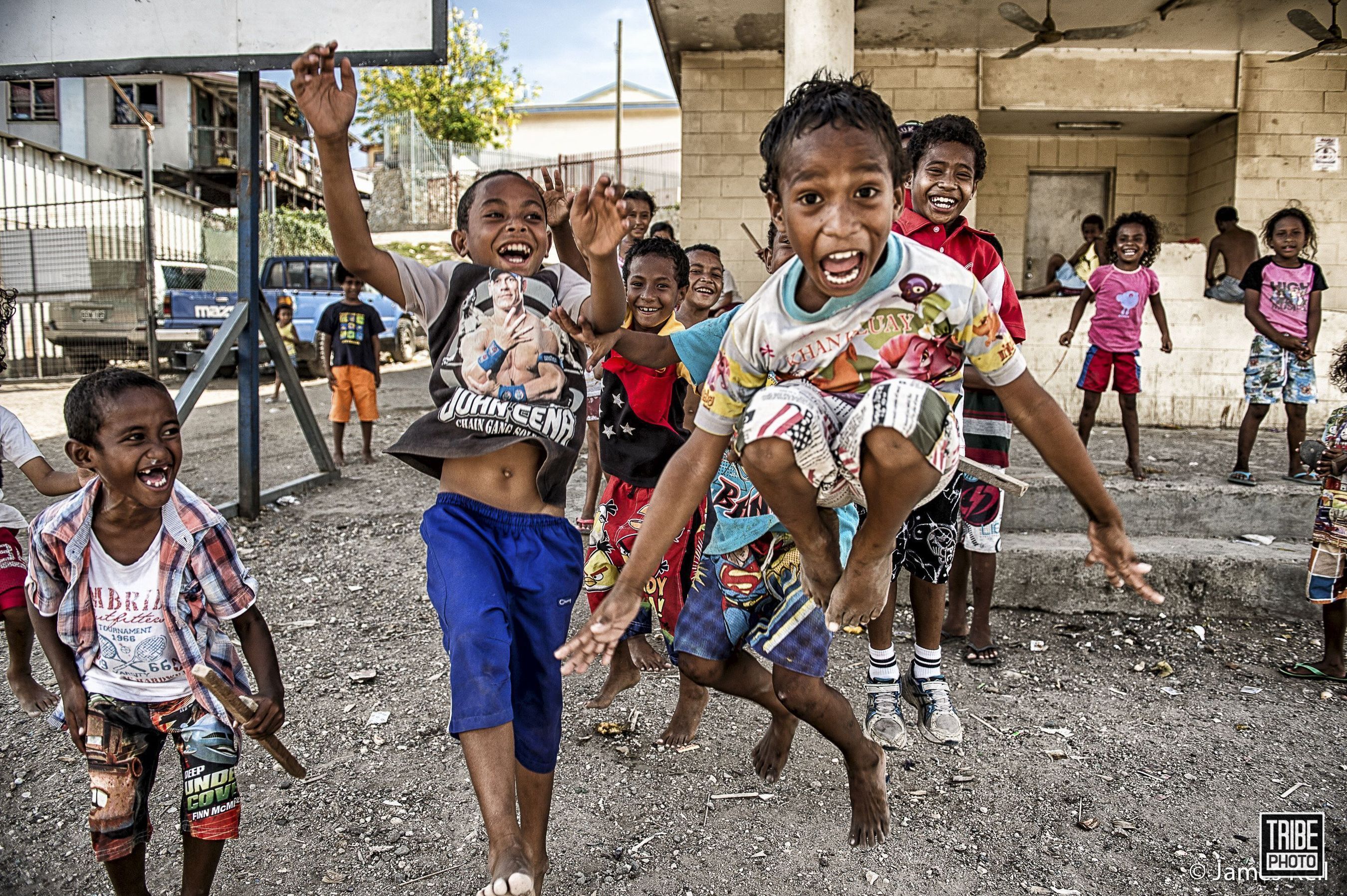 Photography arouses a lot of excitement. These kids are in Port Moresby. (PRNewsFoto/Tribe Photo)