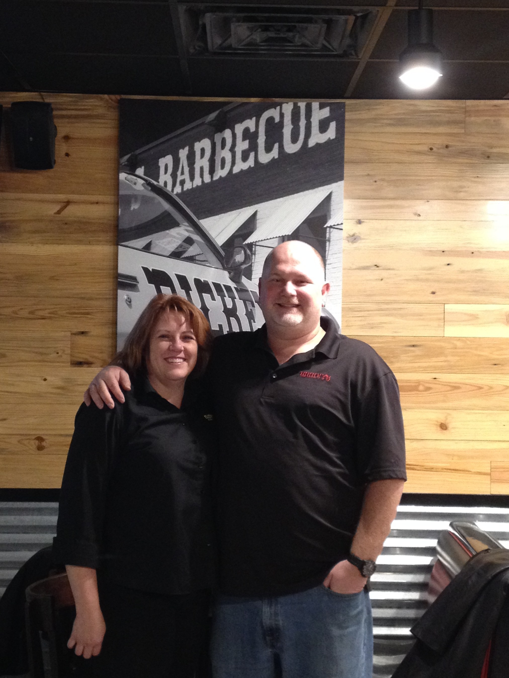 Stephanie and Preston Reeves inside their new Dickey's Barbecue Pit. The couple celebrates a three day grand opening starting Thursday.