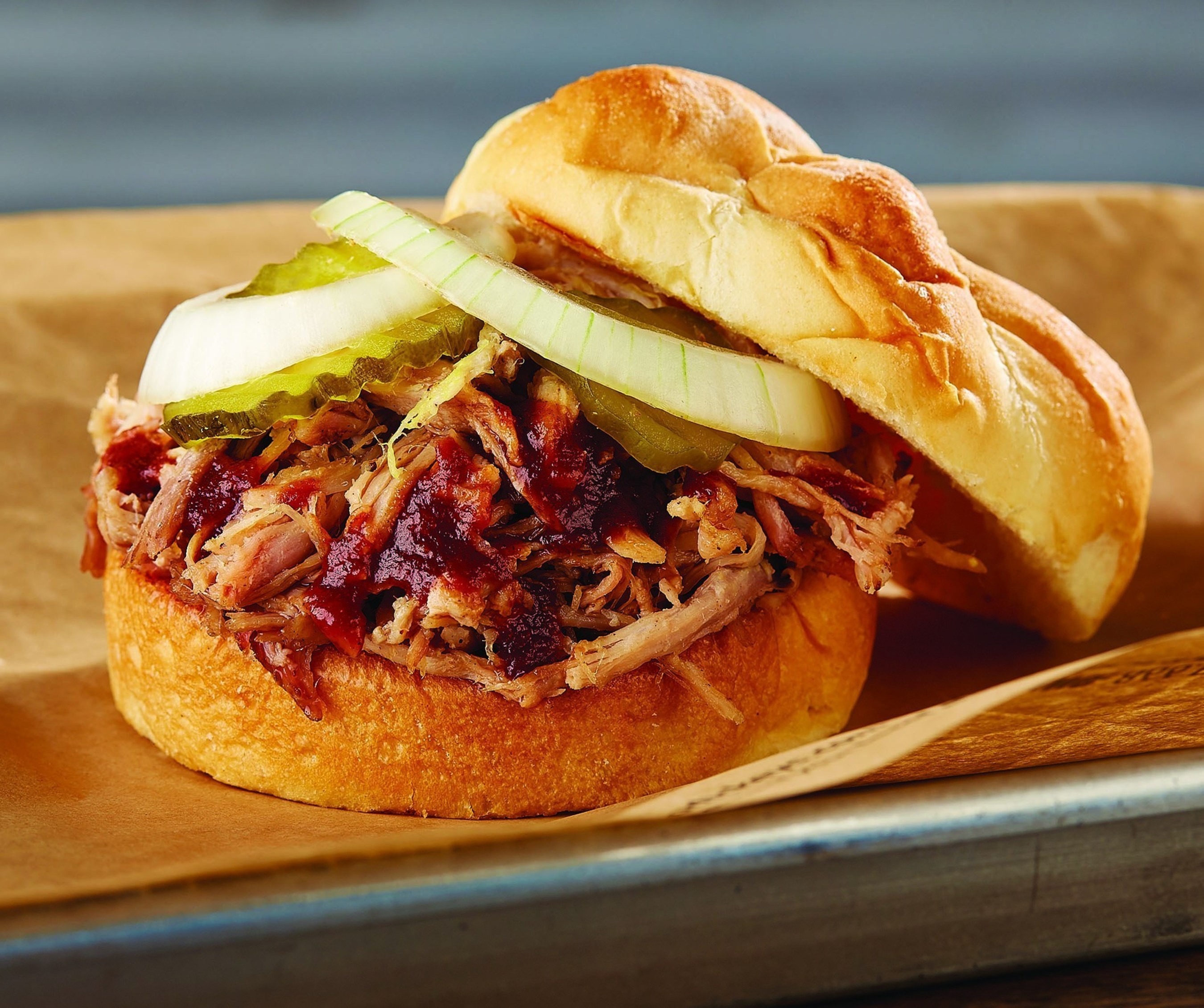 Dickey's Barbecue Pit arrives to Macomb Township on Thursday with a three day grand opening. Location serves up $2 pulled pork sandwiches on Saturday when three lucky guests win free barbecue for an entire year!