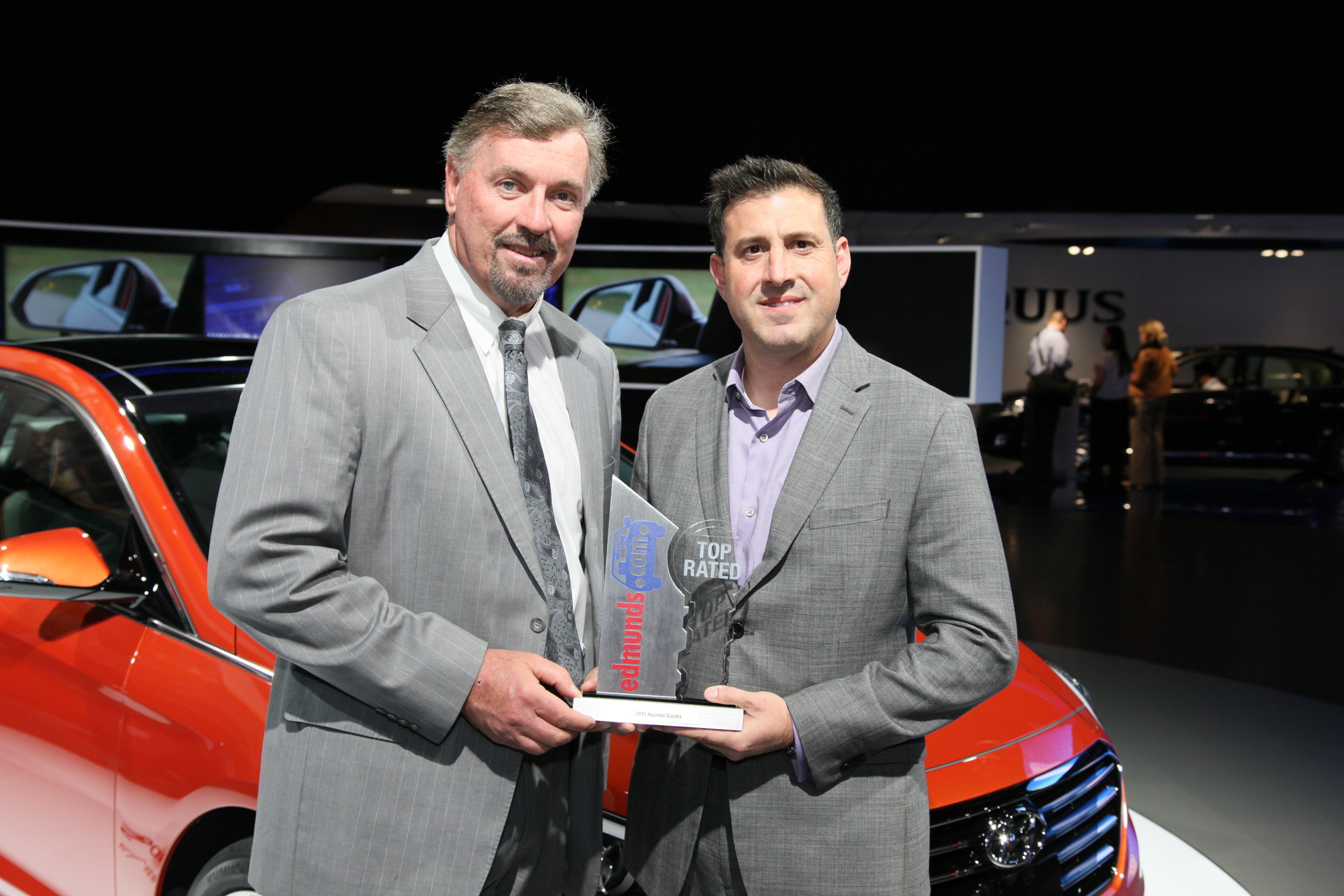 Dave Zuchowski, president and CEO, Hyundai Motor America receives the Edmunds.com Top Rated Vehicle award for the 2015 Sonata from Scott Oldham, editor in chief, Edmunds.com.