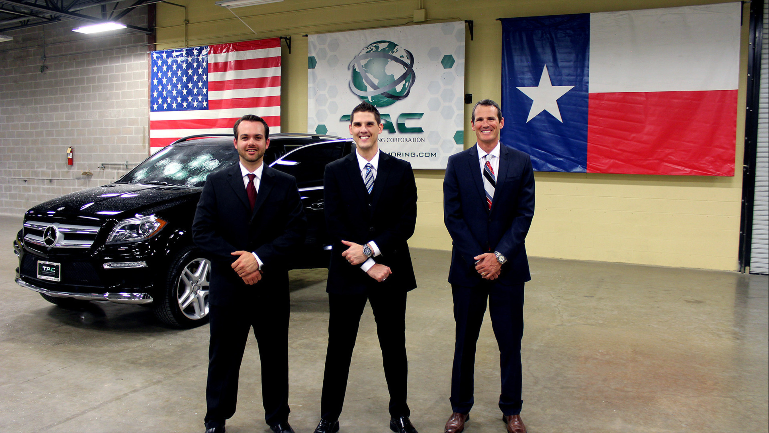Texas Armoring staff after successful extreme product test. Left to Right, Lawrence Kosub (Sales Manager), Jason Forston (EVP/COO), and Trent Kimball (President/CEO)