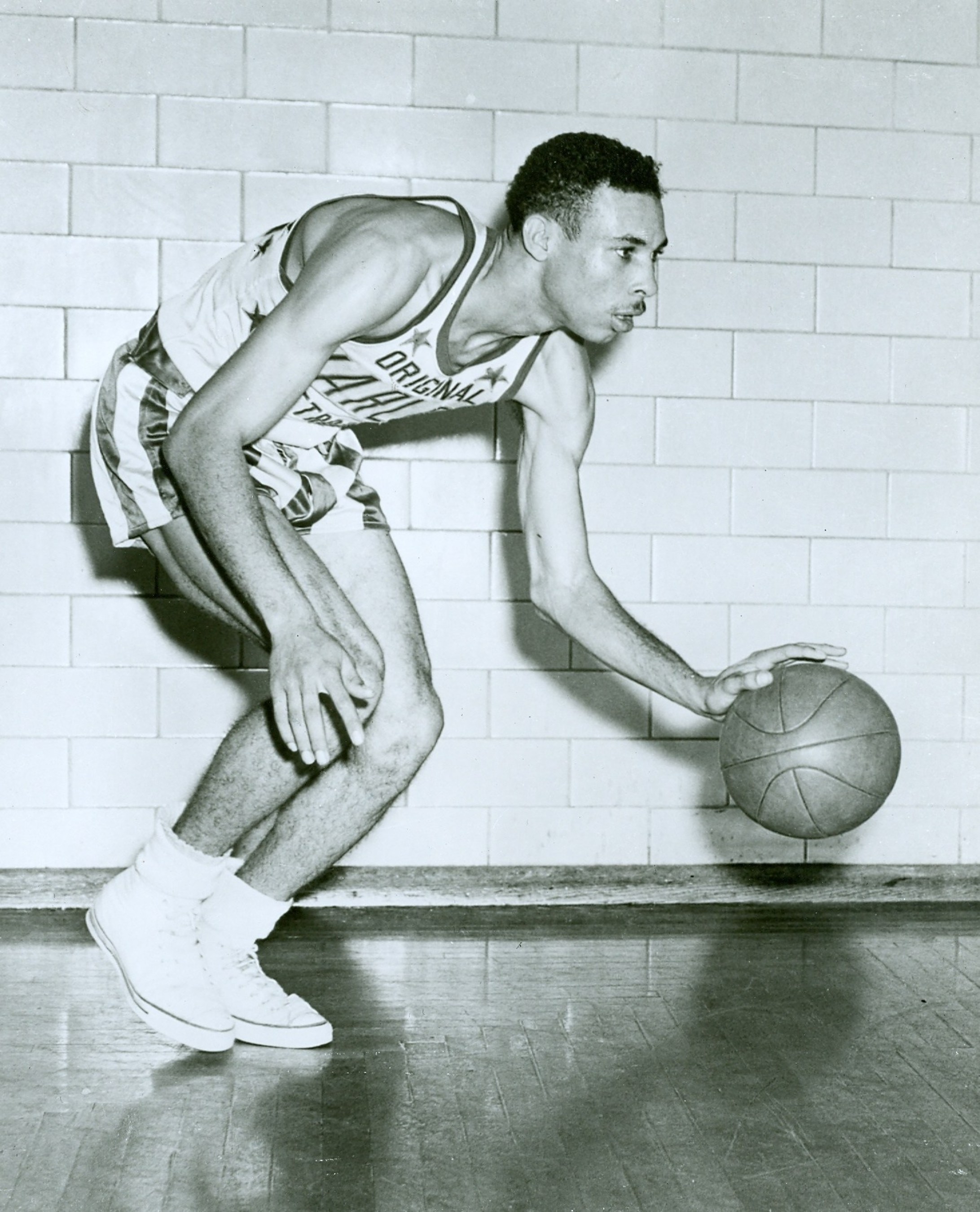 Tex Harrison spent six decades with the Harlem Globetrotters as a player and coach.