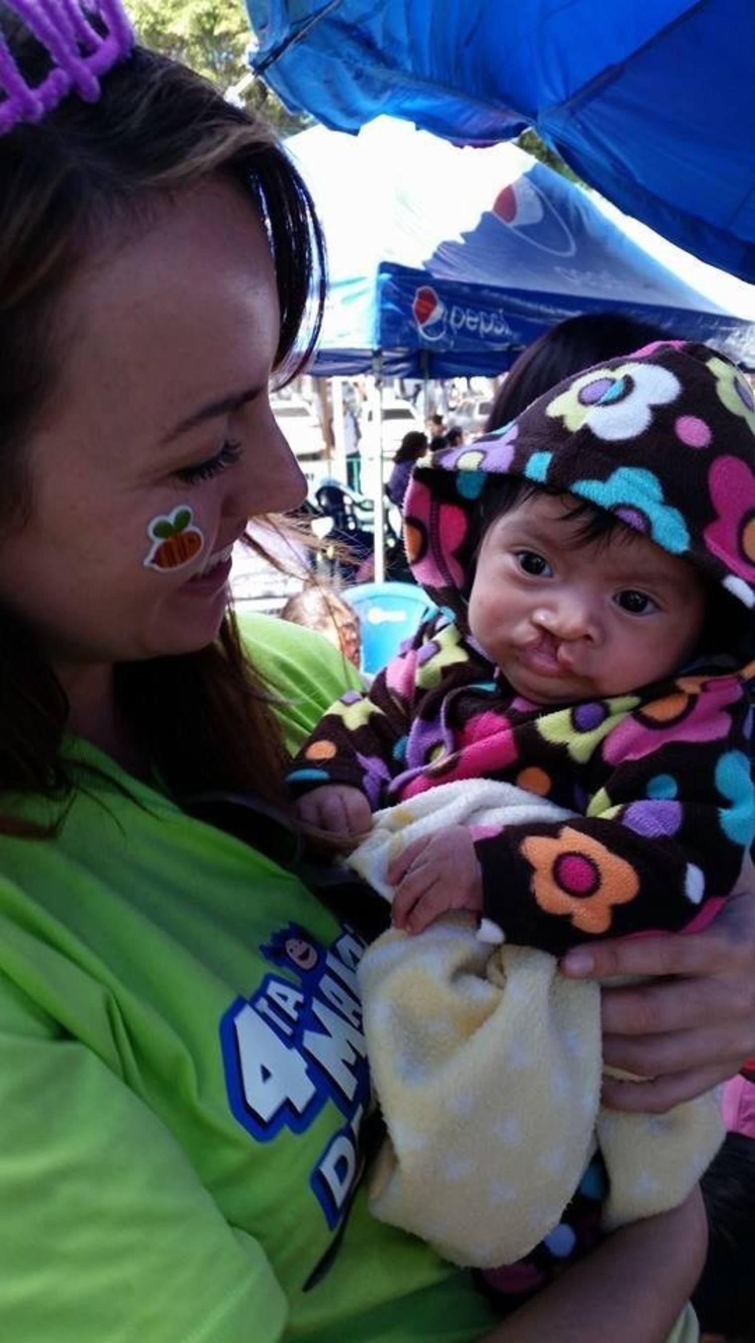 Caitlin Carey, Managing Partner at the Distinctive Edge, Attends Operation Smile Mission