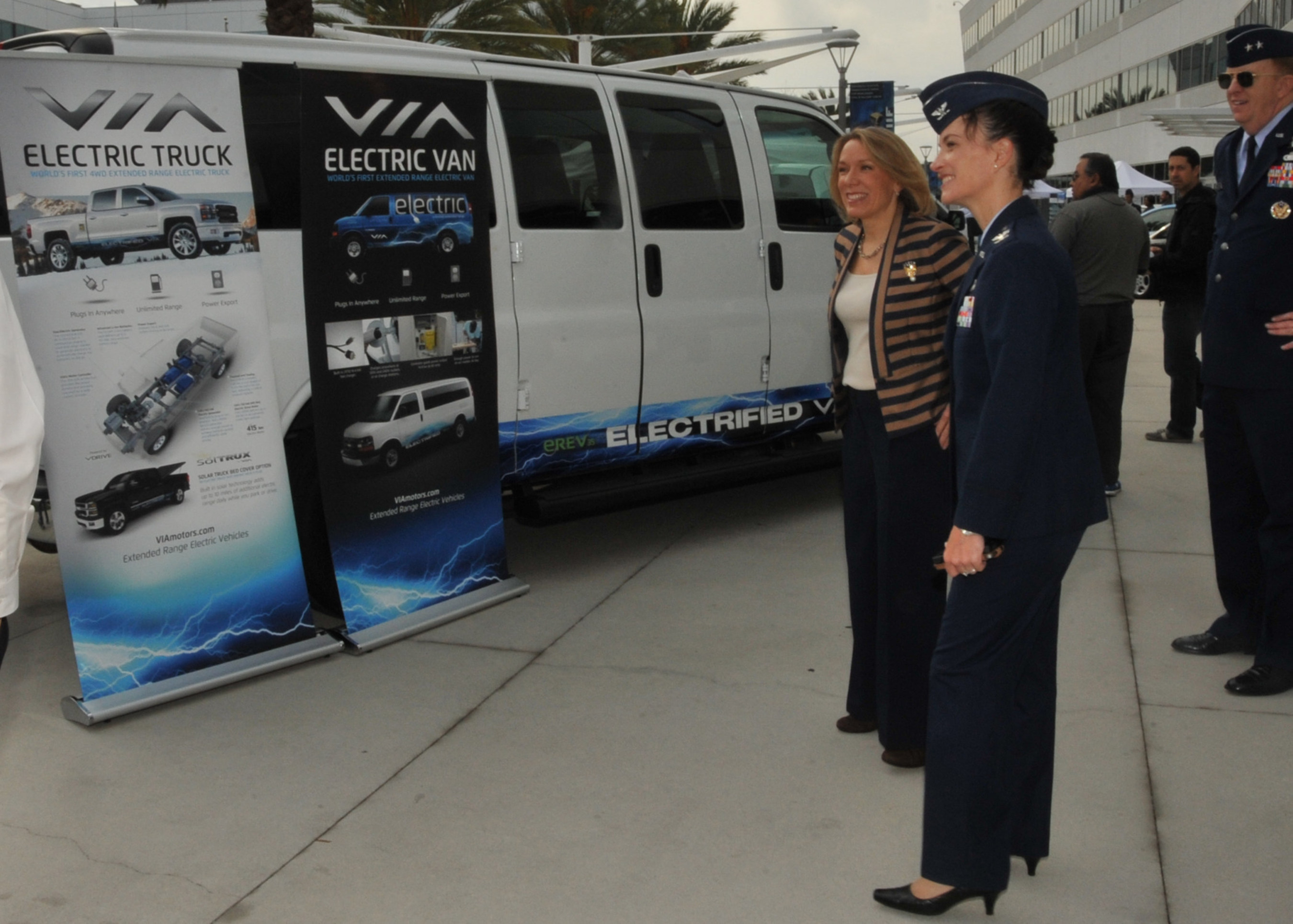 Assistant Secretary of the Air Force for Installations, Environment, and Energy Miranda A.A. Ballentine visits the Space and Missile Systems Center plug-in electric vehicle fleet unveiling at Los Angeles Air Force Base on Nov 14, 2014 with hosts SMC Vice Commander Maj. Gen. Robert McMurry and 61st Air Base Group commander Col. Donna Turner (pictured on right).  The all-electric/hybrid fleet is the first of its kind in the Dept. of Defense and will serve as a year-long test for expansion throughout the DoD.  (U.S. Air Force photo by Sarah Corrice)
