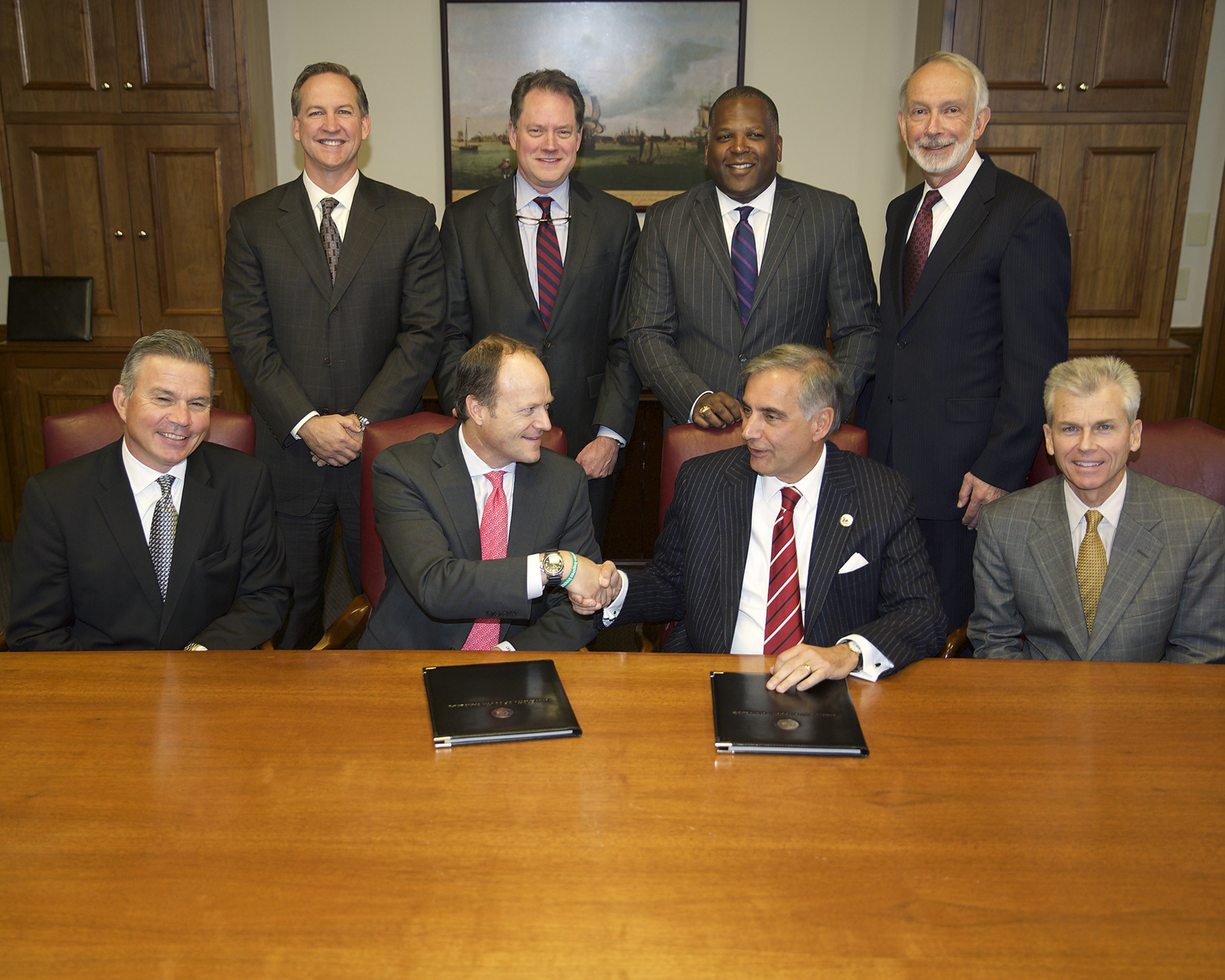 IBM, the University of South Carolina (USC) and Fluor Corporation today announced the formation of the Center for Applied Innovation. (seated from left) Mark Easton, VP, Industry Solution Sales, IBM; Cameron Art, General Manager of Application Management Services, IBM; Harris Pastides, President, USC; Gene Warr, Chairman of the Board of Trustees, USC (standing from left) David Miller, Director, Application Management Services North America, IBM; Andy Bernardin, Director of Enterprise Sales for South...