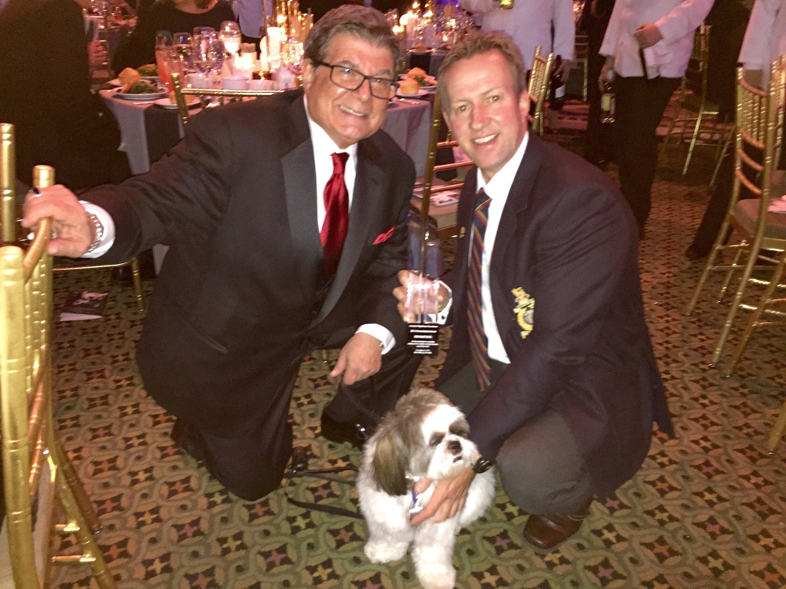 American Dog Rescue Founder Arthur E. Benjamin, Pen Farthing of Nowzad Dogs and Benjamin's sidekick Bandit pose for a photo at the Humane Society Of The United States' "To The Rescue! New York" benefit November 21. Farthing received American Dog Rescue's 2014 Humanitarian Award at the event. Proceeds from the event, held at Cipriani on 42nd Street in New York City, benefit HSUS' ongoing, national animal rescue efforts. Farthing also recently won the 2014 CNN "Hero of the Year Award."