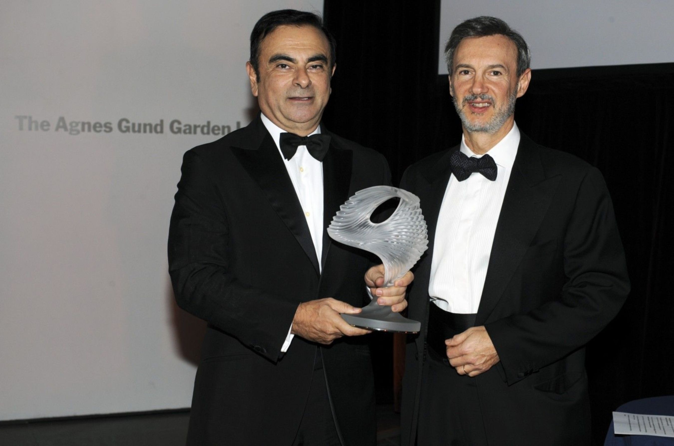 Carlos Ghosn, CEO of the Renault-Nissan Alliance, receives Action Against Hungerâeuro(TM)s Humanitarian Award at the organizationâeuro(TM)s annual gala Thursday night at the Museum of Modern Art in New York. Next to him on the right is Raymond Debbane, Chairman of the Board of Directors of Action Against Hunger. The group honored Nissan, Renault and the Alliance for their global humanitarian work, including the establishment of an emergency rapid-response fund to assist with humanitarian disasters. Photo by Stephane Kossmann (PRNewsFoto/Renault-Nissan Alliance)
