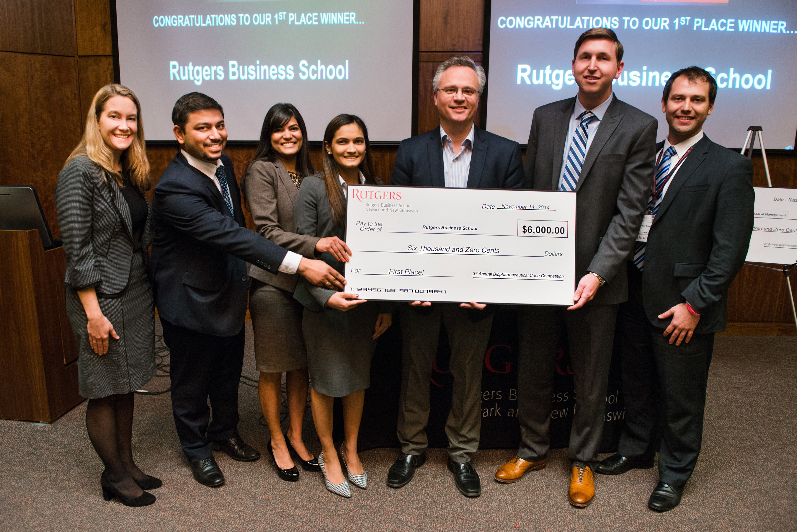 Rutgers MBA students Paul Rosiak, Michael Kwatkoski, Sonal Patel, Mittal Shah and Kinushuk Saxena are joined by Sharon Lydon, executive director of the Rutgers MBA Program, (far left) and Michael Barnett, vice dean for academic programs (center). The students won first place in the annual Rutgers biopharmaceutical case competition.