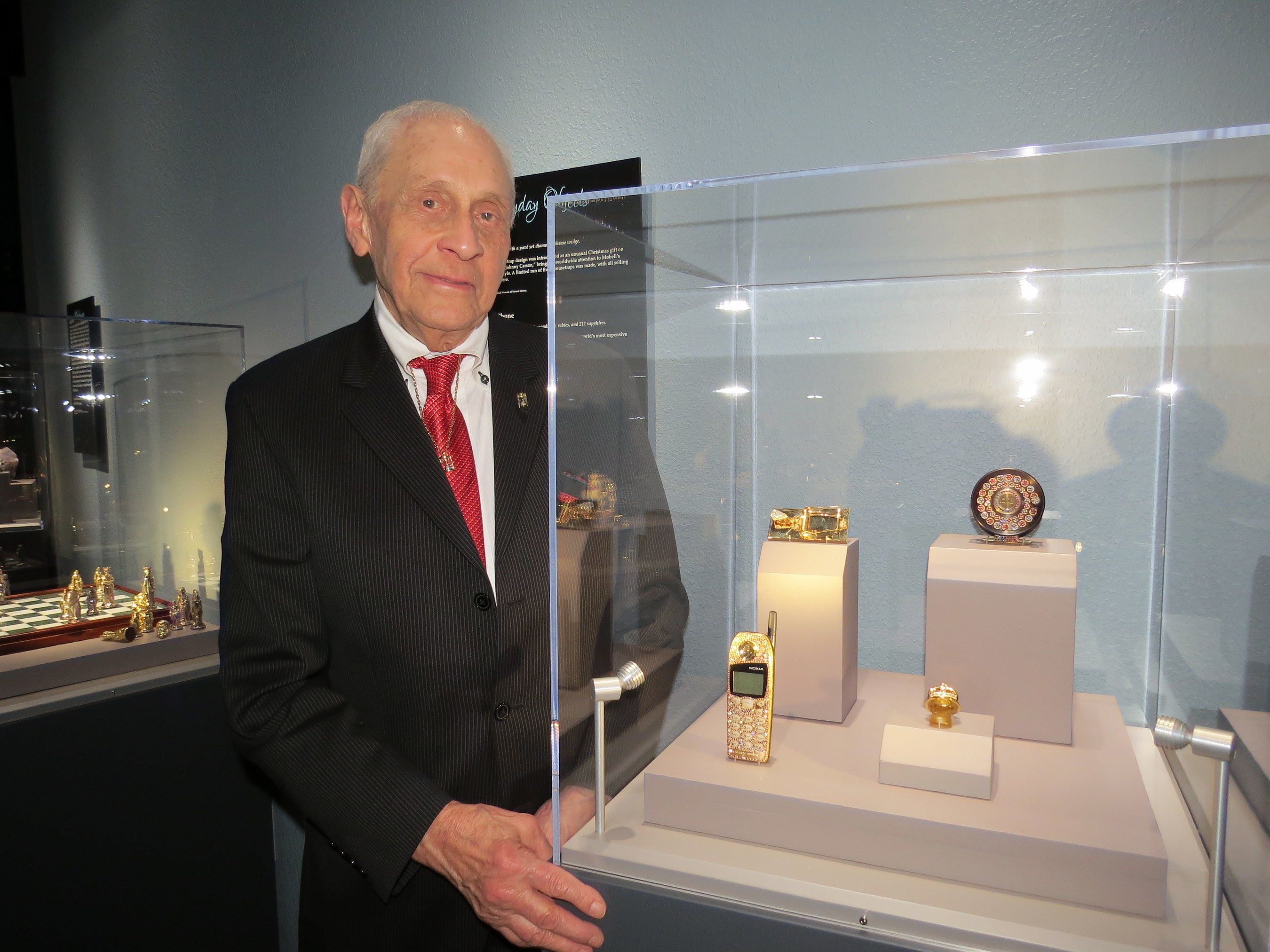 Famous jewelry designer Sidney Mobell helps open special exhibit Jeweled Objects of Desire at Tellus Science Museum.