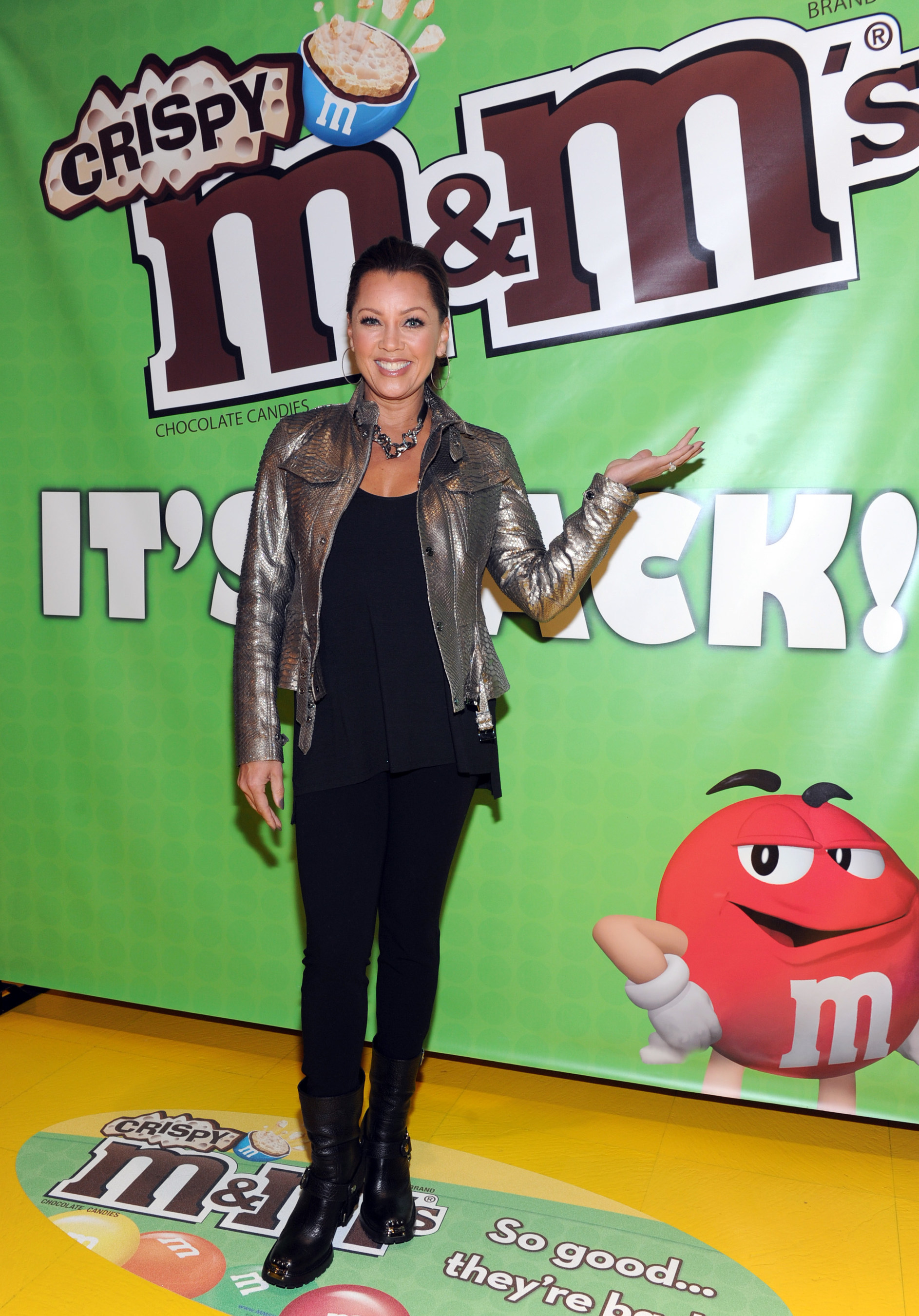 (December 9, 2014) Vanessa Williams, the multi-talented entertainer and voice behind M&M'S(R) Brand spokescandy Ms. Brown, welcomes the first batch of M&M'S(R) Crispy to M&M'S World(R) in Times Square. The product will begin returning to store shelves nationwide this week after a 10-year hiatus, thanks to a vocal fan base who pleaded for its return. (Photo by Diane Bondareff for Mars Chocolate North America)