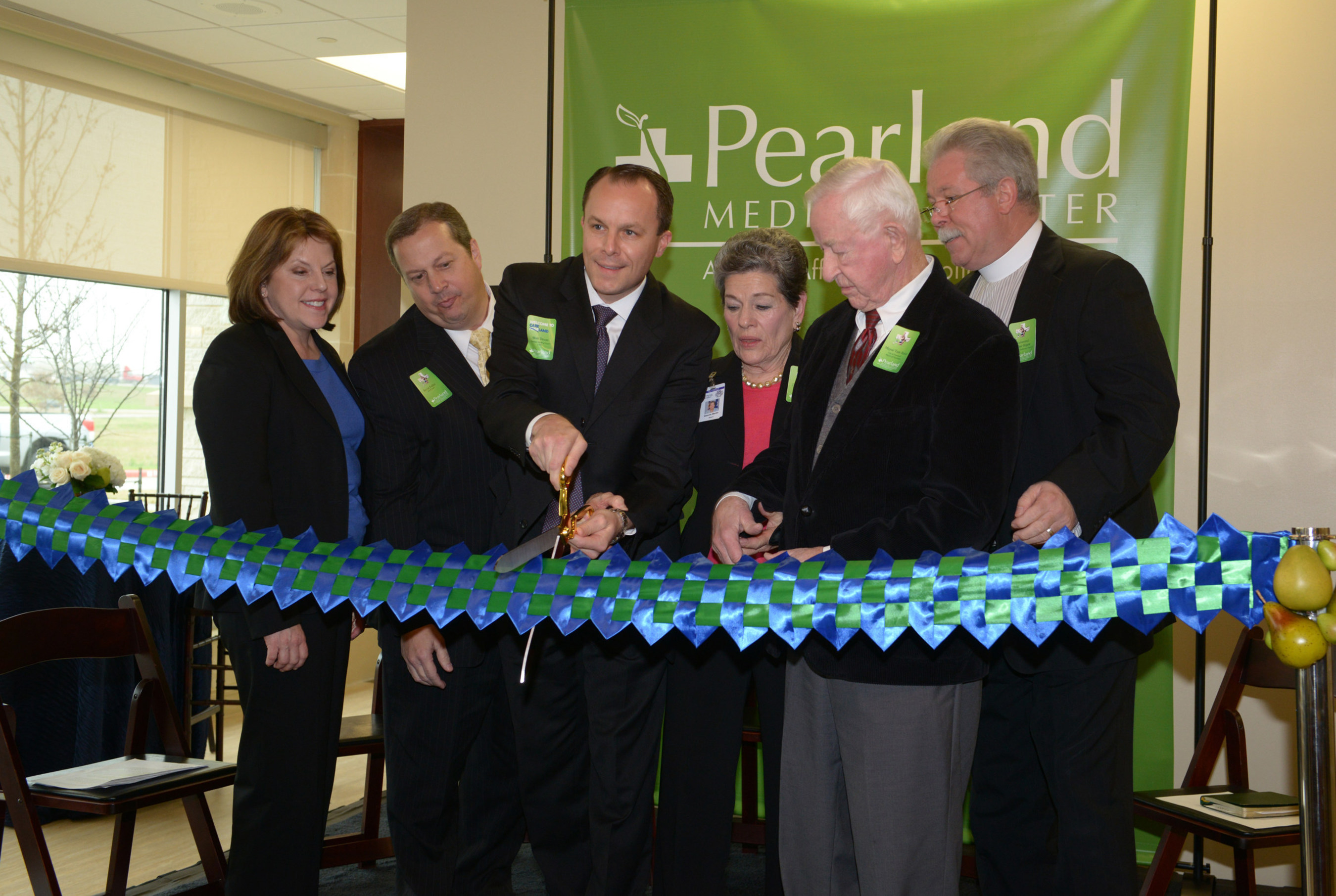 HCA Gulf Coast Division President, Maura Walsh; Pearland Medical Center Board of Trustees Chairman, Kevin Fuller; Pearland Medical Center CEO, Matt Dixon; Manvel Mayor, Delores Martin; Pearland Mayor, Tom Reid; and Reverend Brian Gigee "Cut the Ribbon" on Friday, January 9th for the new $71 million Pearland Medical Center.