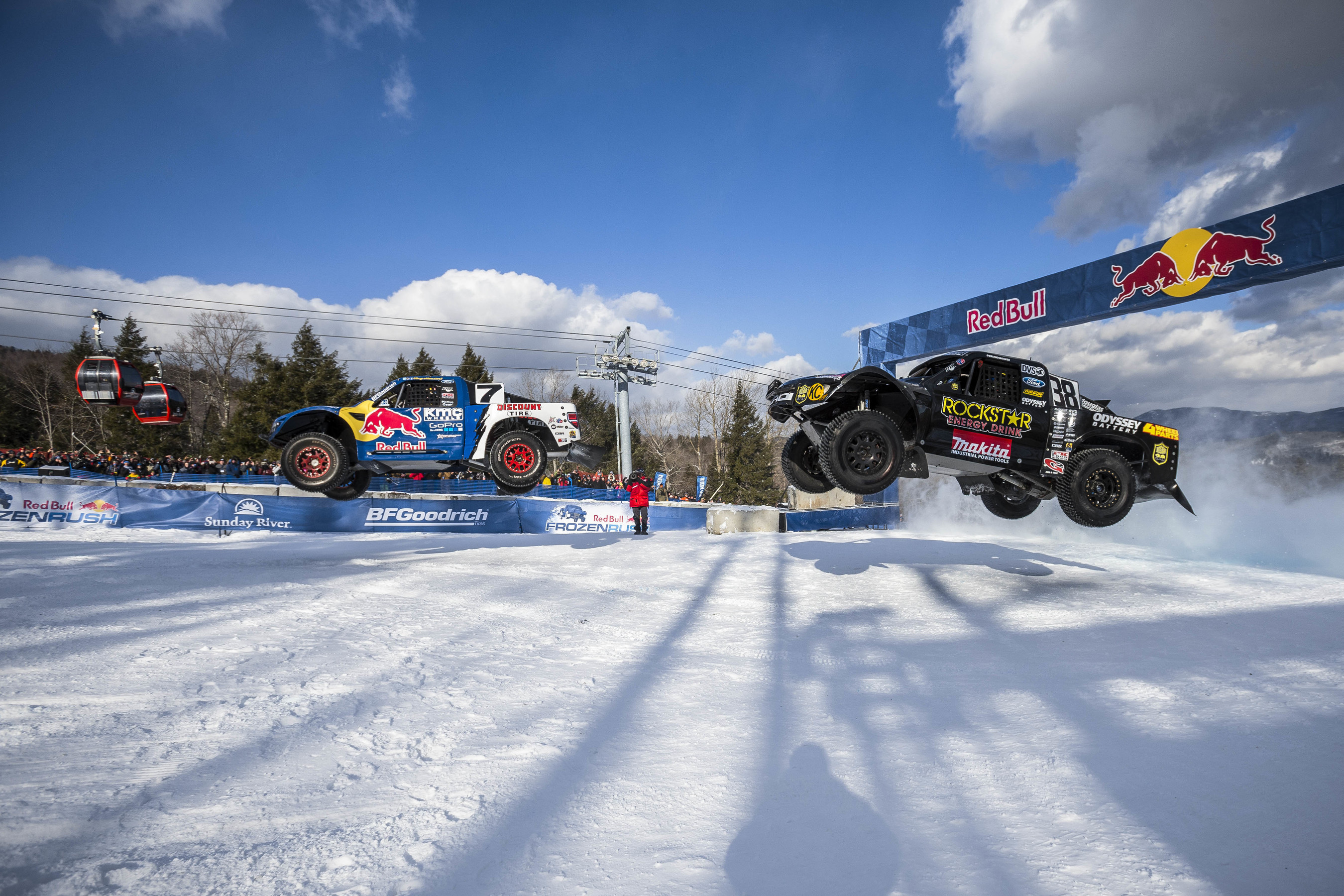 Off-road trucks race head-to-head on snow for Red Bull Frozen.