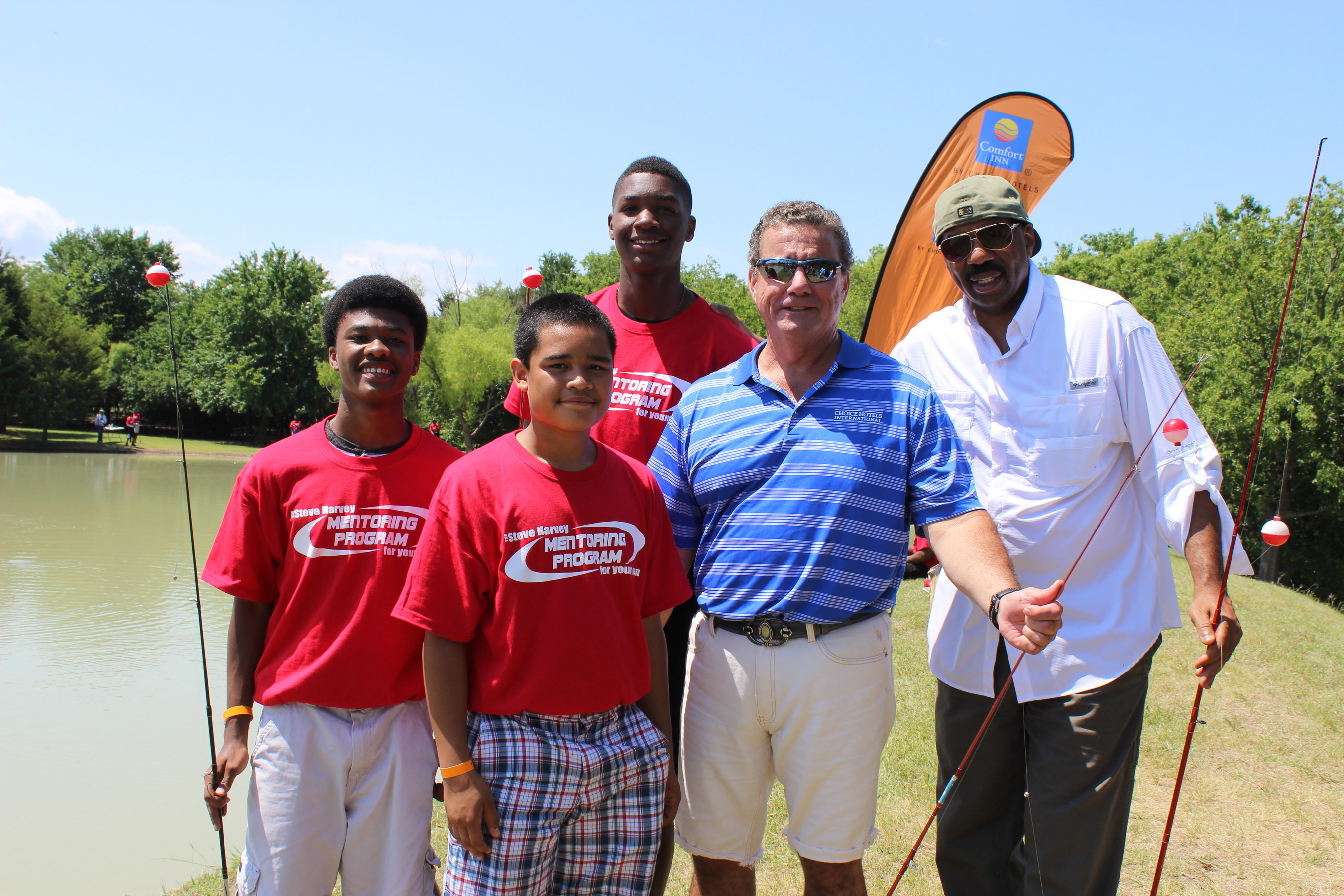 Choice Hotels President and CEO Steve Joyce with Steve Harvey and Mentoring Camp participants
