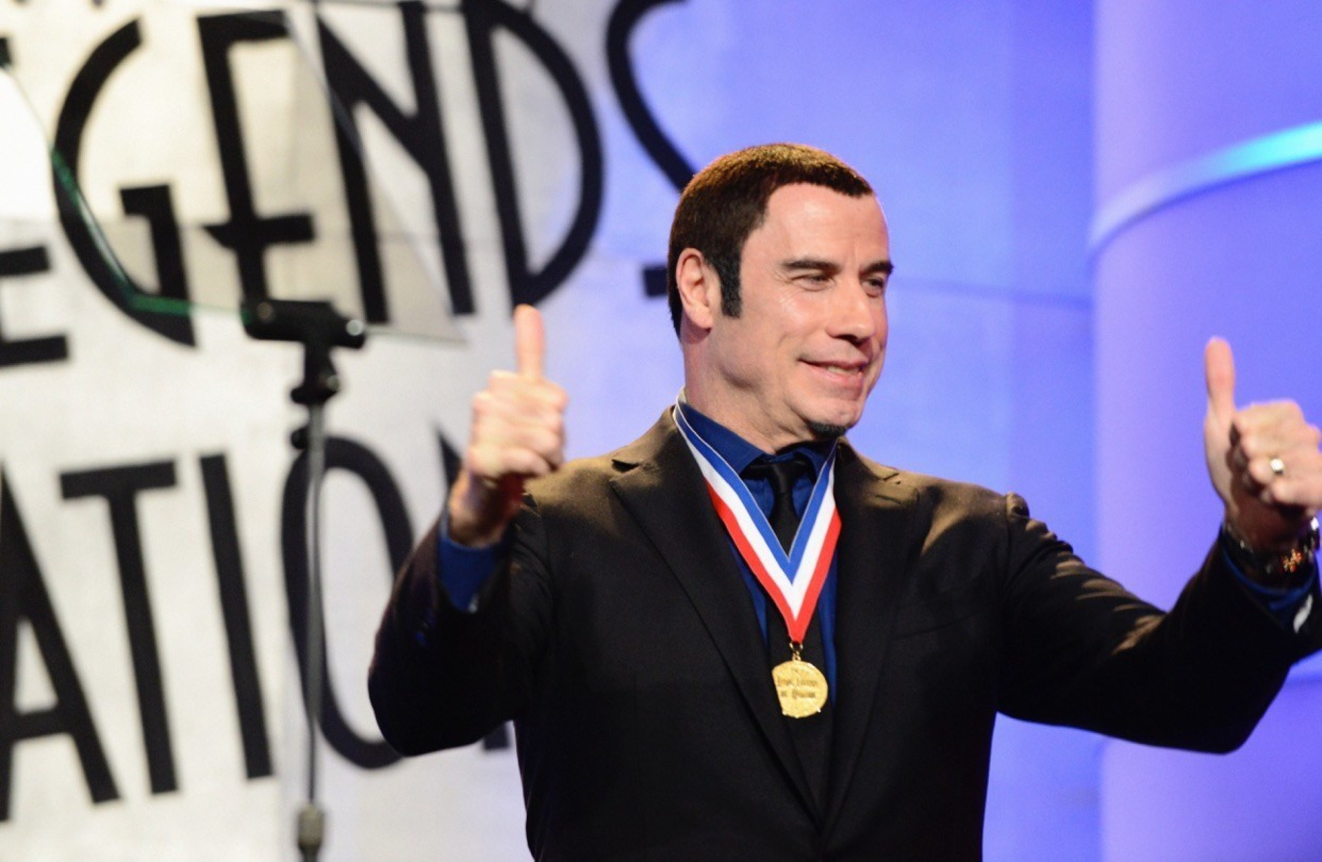 John Travolta, the "Official Ambassador of Aviation (R)," will host the prestigious "Living Legends of Aviation Awards," this Friday, January 16, 2015 at the Beverly Hilton ballroom in Beverly Hills, Calif.