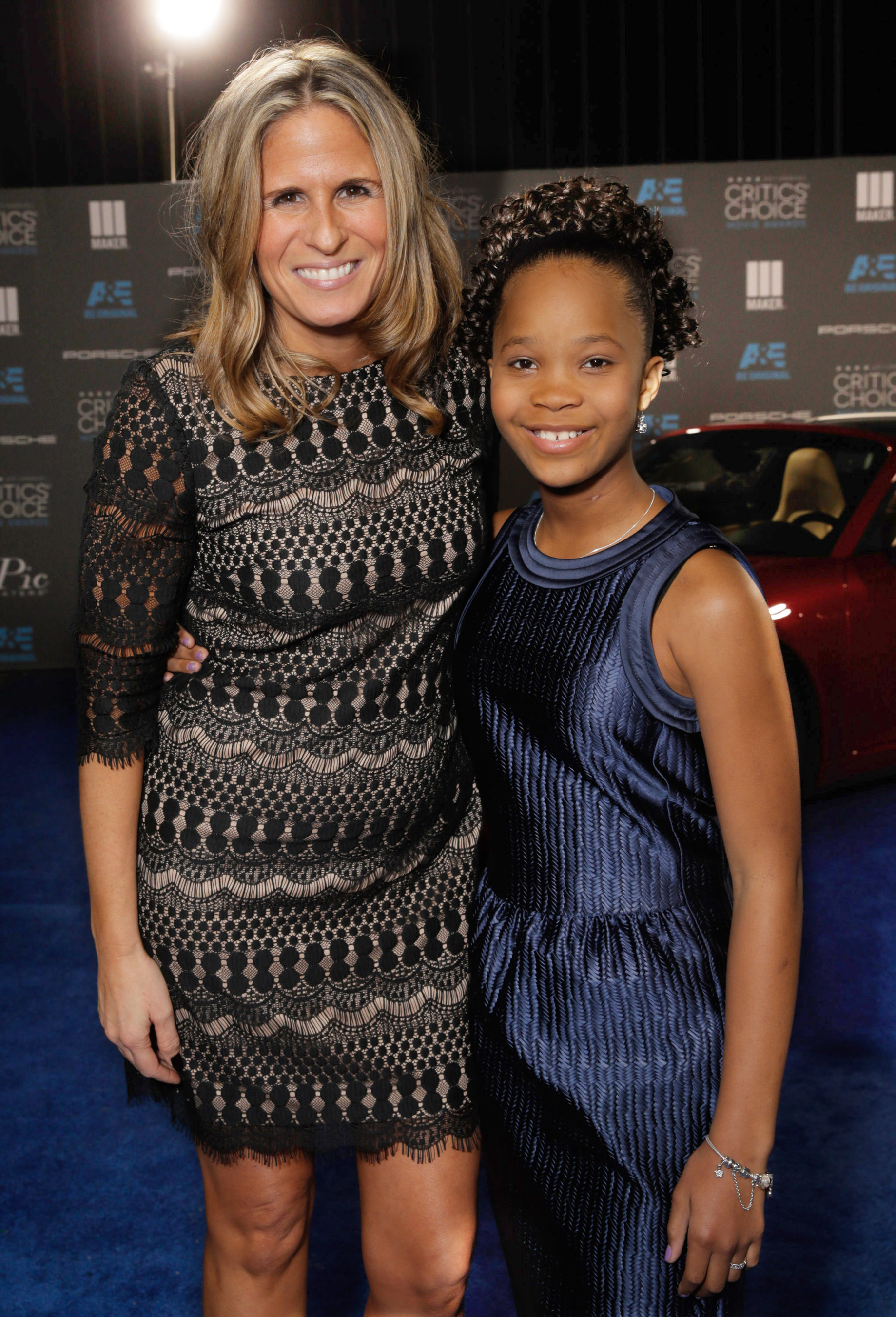 Cristina Cheever, left, and Quvenzhane Wallis arrive as Porsche celebrates the 20th Annual Critics' Choice Movie Awards at the Hollywood Palladium on Thursday, Jan.15, 2015, in Hollywood, Calif. (Photo by Todd Williamson/Invision for Porsche/AP Images)