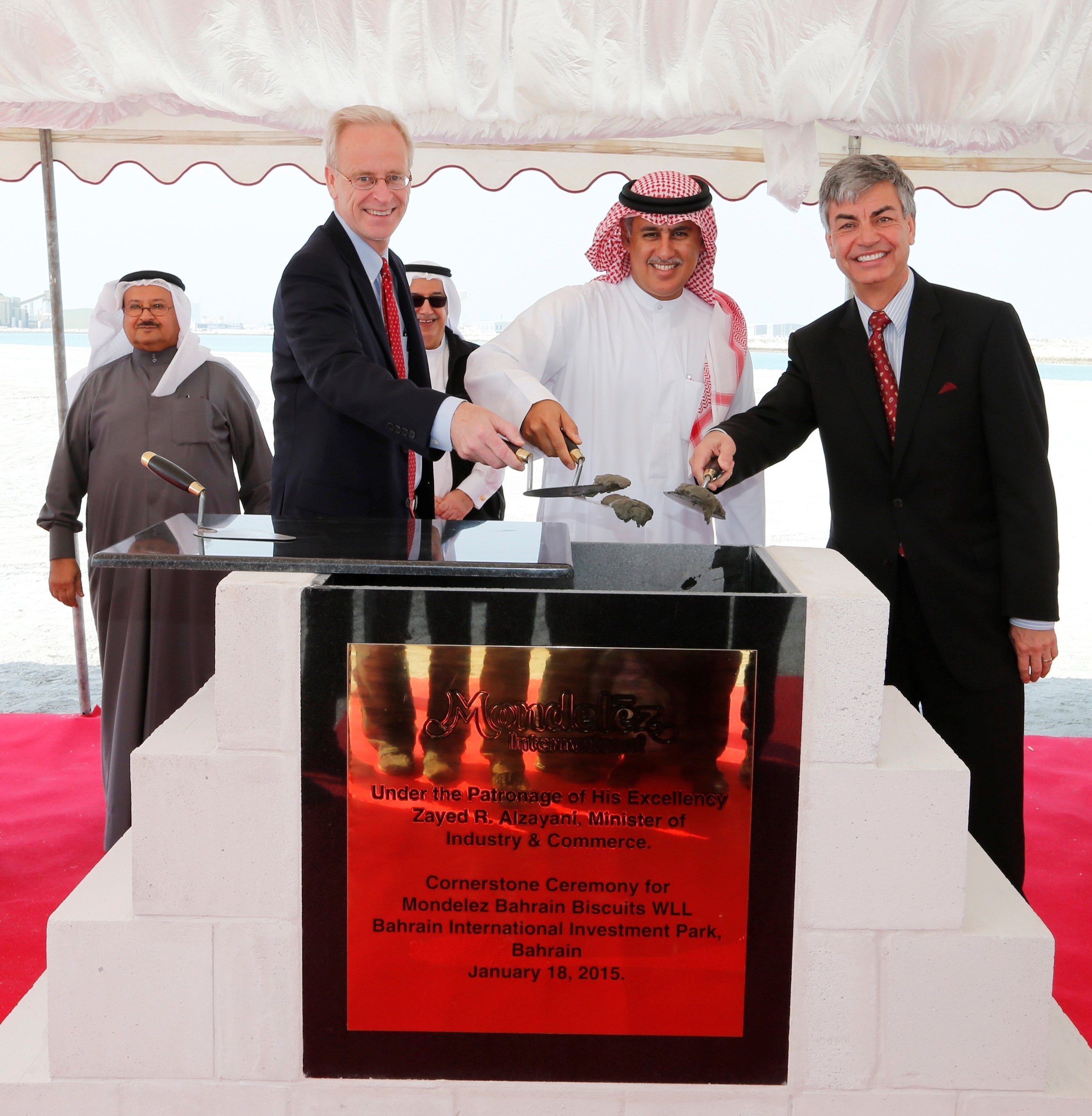 Mondelez International Lays Cornerstone for Construction of $90 Million Biscuit Plant in Bahrain - US Ambassador to Bahrain, William Roebuck; Bahrain's Minister of Industry & Commerce, Zayed R. Alzayani; Mondelez International's Executive Vice President, Integrated Supply Chain, Daniel Myers.
