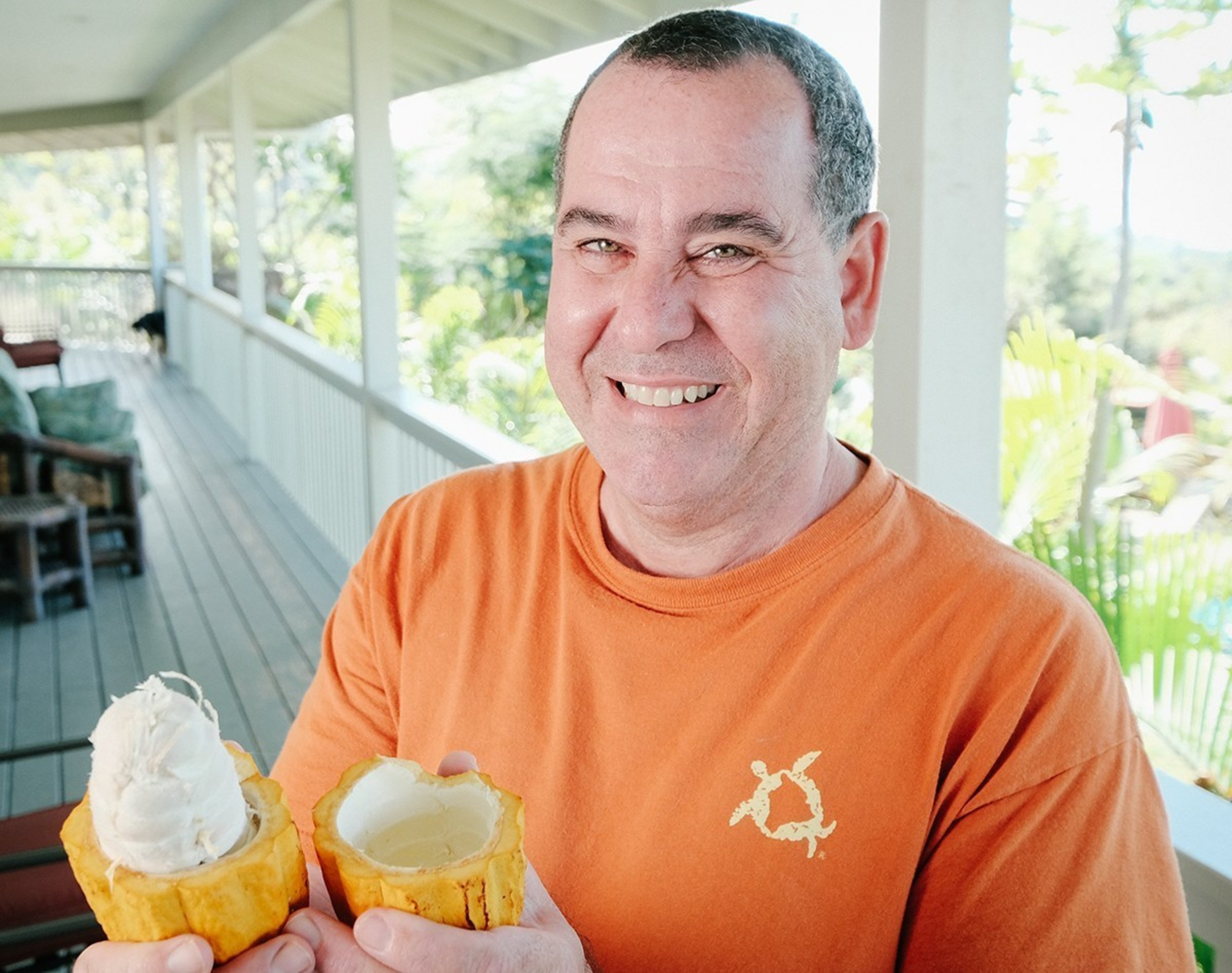 Greg Colden, co-owner of Kokoleka Farms, a cacao farm in Kona, Hawaii holds a cacao pod. Guests of the chocolate tour will sample the raw cacao and chocolate created from the cacao on the farm.