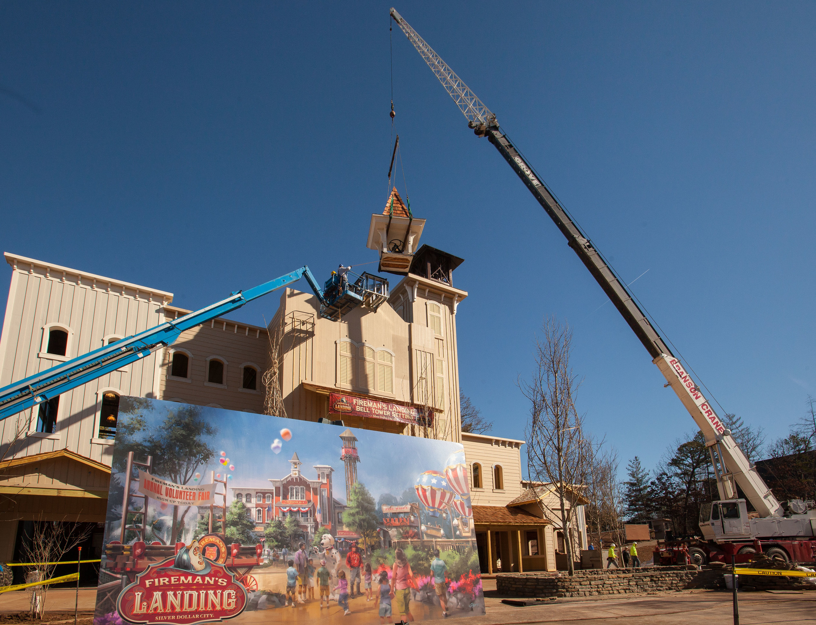 The setting the bell tower marks progress on the $8 million all-new themed area Fireman's Landing at Silver Dollar City in Branson, Missouri.