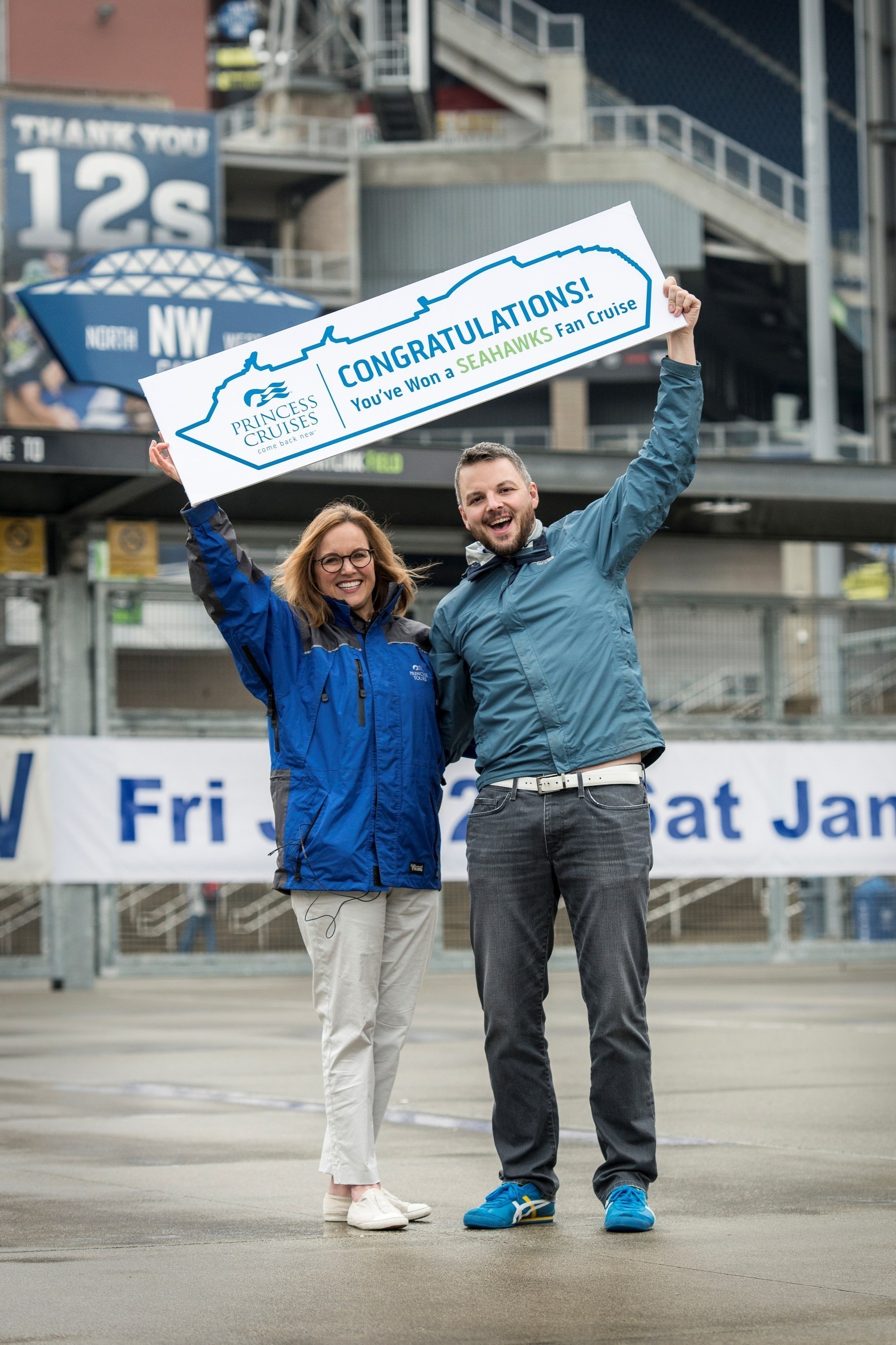 Sailing with the Seahawks - Princess Cruises Vice President Lisa Syme presents Seahawks Super fan PJ LeDorze with an invitation to join the first-ever Seattle Seahawks fan cruise departing from Seattle to Alaska over Father's Day in June.