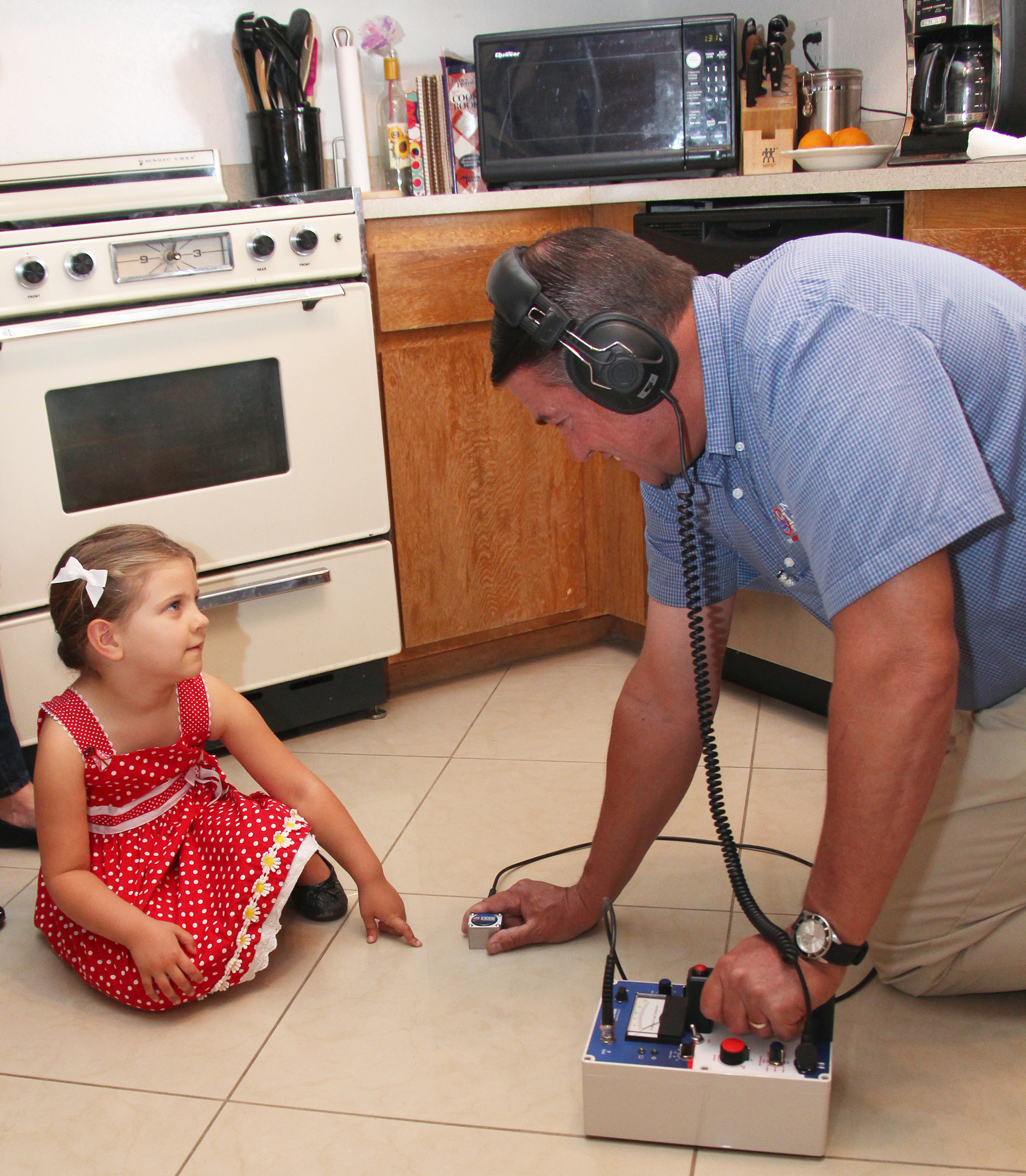 A certified specialist uses an ultrasonic microphone, along with the help of a customer, to find a slab leak. American Leak Detection offers leak detection without destruction to its customers in five countries. Since it was founded in 1974, American Leak Detection has found more than 7 million leaks in homes, government facilities and businesses worldwide.