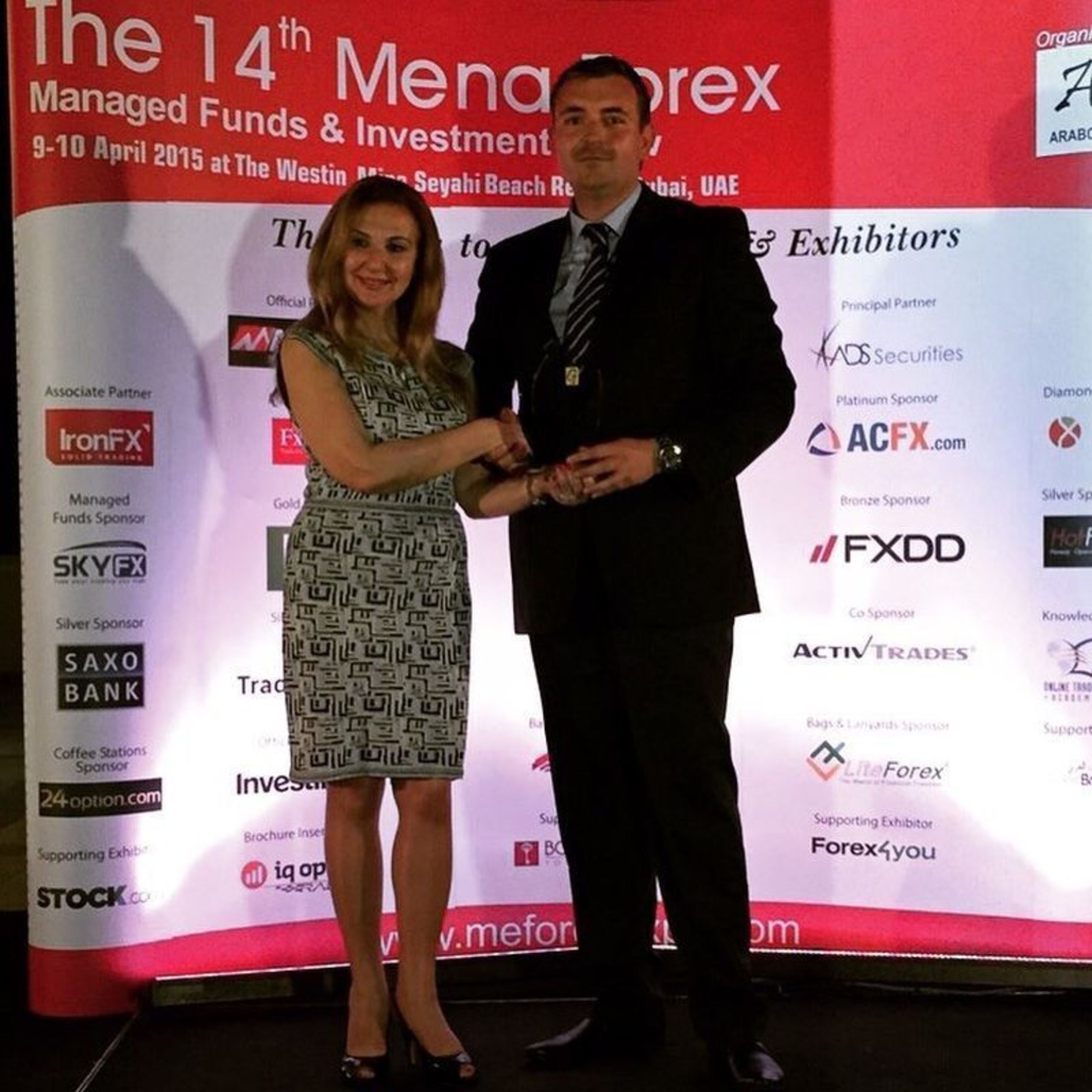 ACFX has been awarded the "Broker of the Year" and "Best Affiliate Program" awards at the closing ceremony of Arabcom's 14th MENA Forex Managed Funds and Investment Expo held in Dubai. Mr. Petar Gazivoda General manager of ACFX received the awards from Mrs. Katia Tayar president of Arabcom Group. (PRNewsFoto/ACFX)