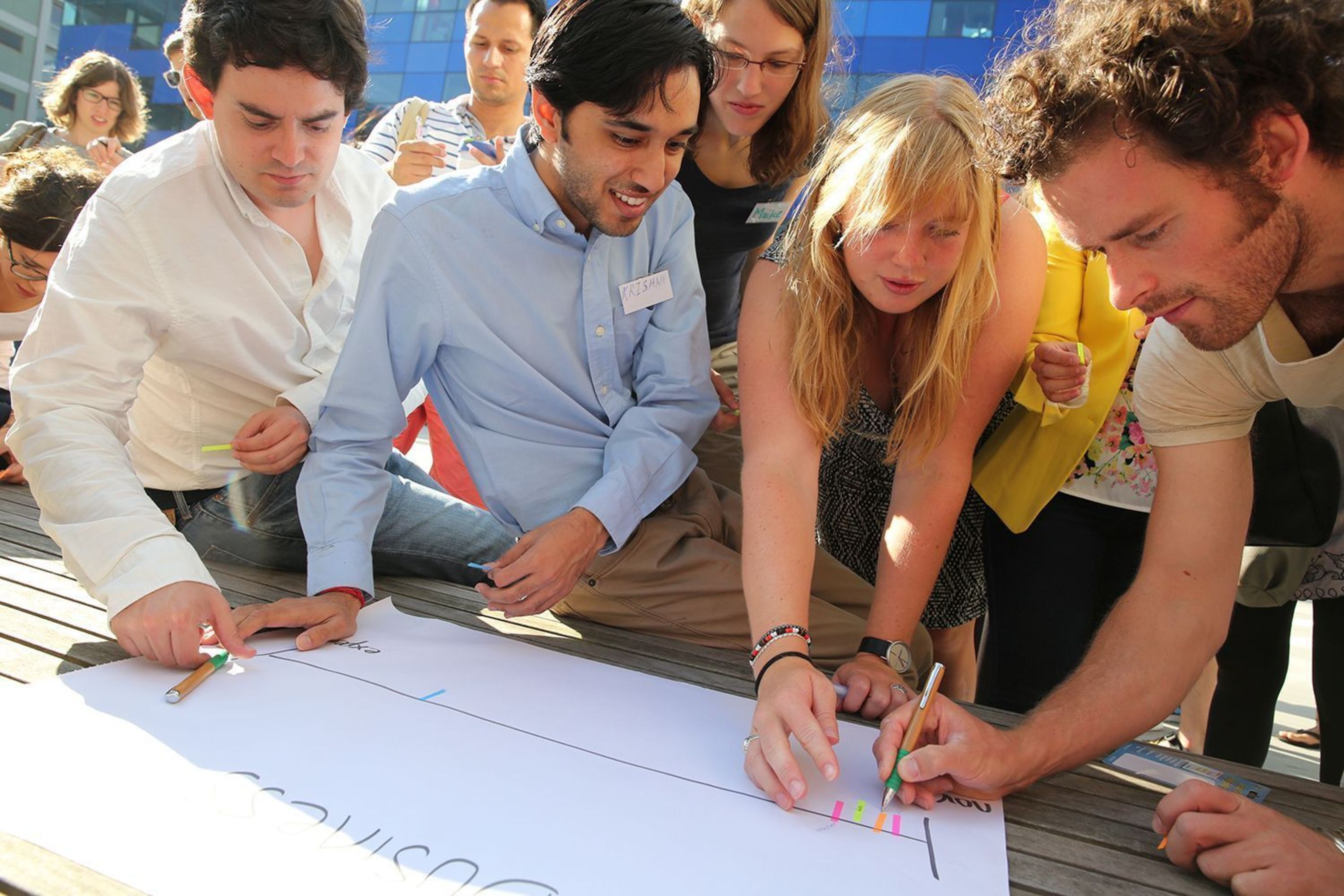 Students and graduates discuss a business plan that helps tackle climate change at Imperial College London, UK. Participants in the 2015 edition of Climate-KIC's European "The Journey" summer school programme work on ideas for solutions to real-world climate change related issues, and compete in teams. Based on their own creativity and climate knowledge, the teams present a detailed business plan to a judging panel consisting of leading European venture capitalists, startup entrepreneurs and scientists. (PRNewsFoto/Climate-KIC)