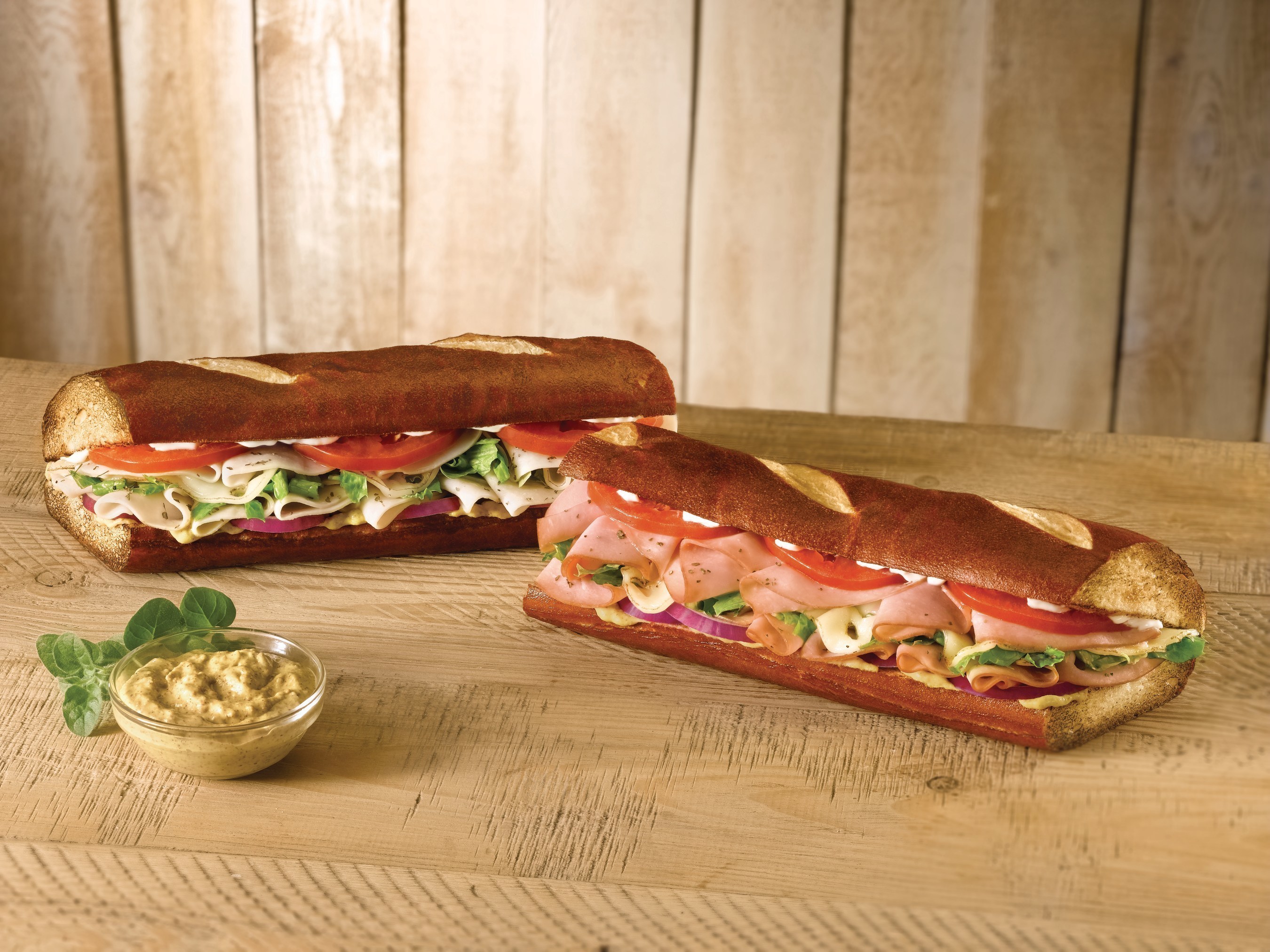Quiznos launches new pretzel bread menu offerings, Ham on Pretzel Bread and Turkey on Pretzel Bread.