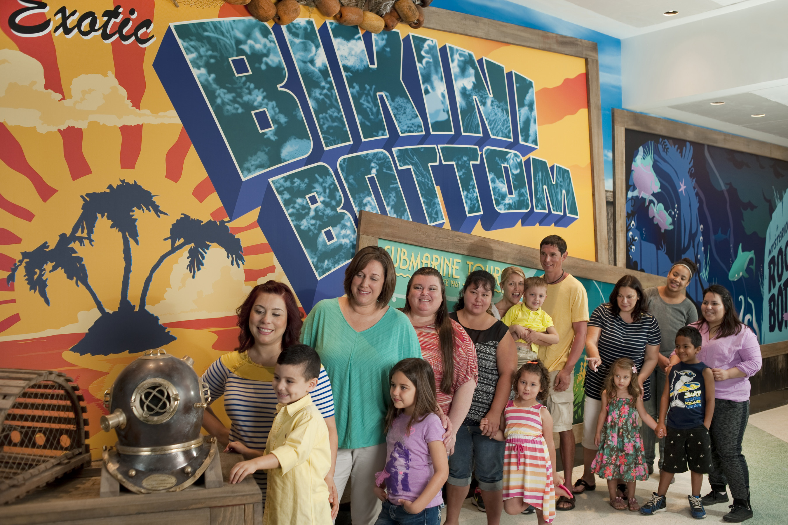 Children and parents view a brass dive helmet and crab trap near the Bikini Bottom mural before entering the new Nickelodeon SpongeBob SubPants Adventure. It opens Memorial Day Weekend at the Discovery Pyramid at Moody Gardens in Galveston, Texas.