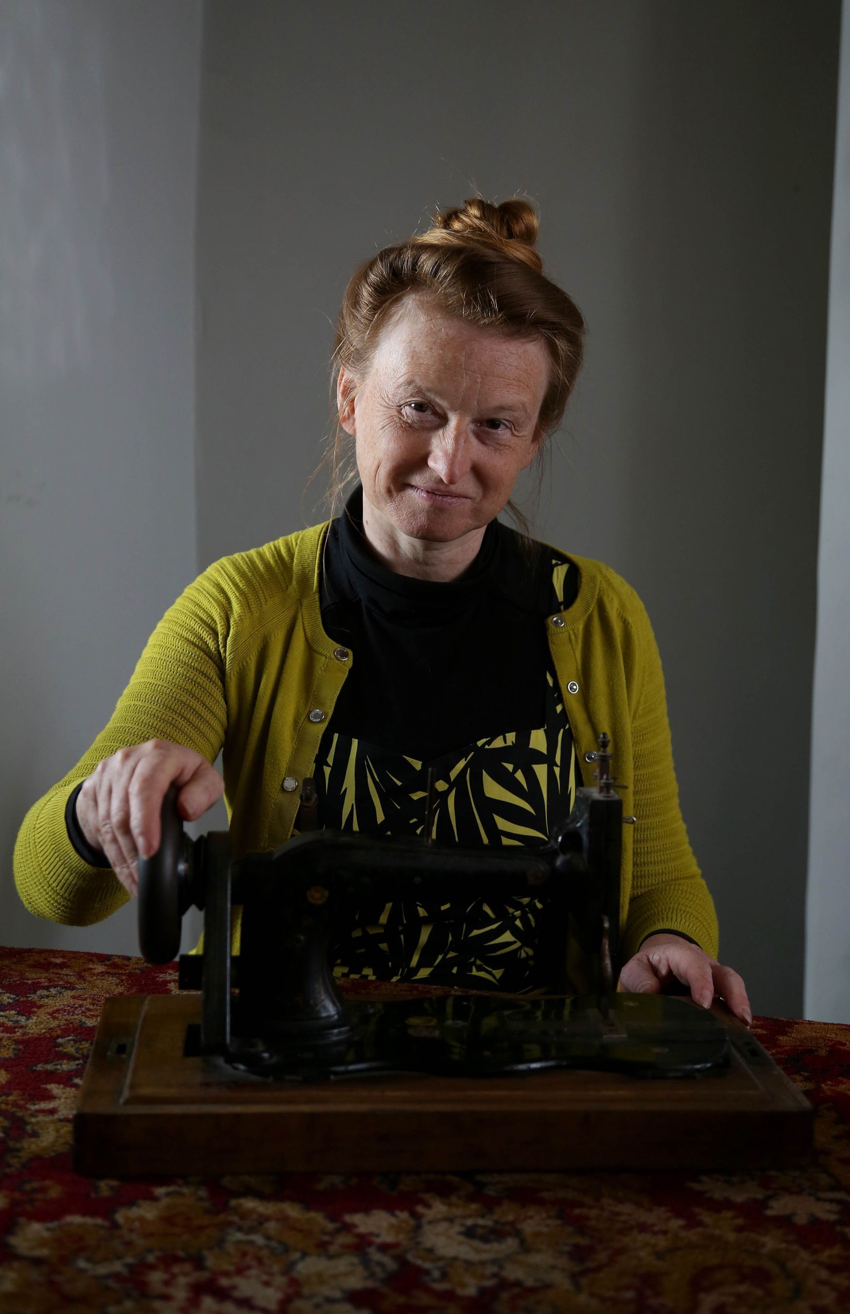 Independent expert and social historian Ruth Goodman with 1890 treasured item the sewing machine - portrait (PRNewsFoto/UIA Insurance)