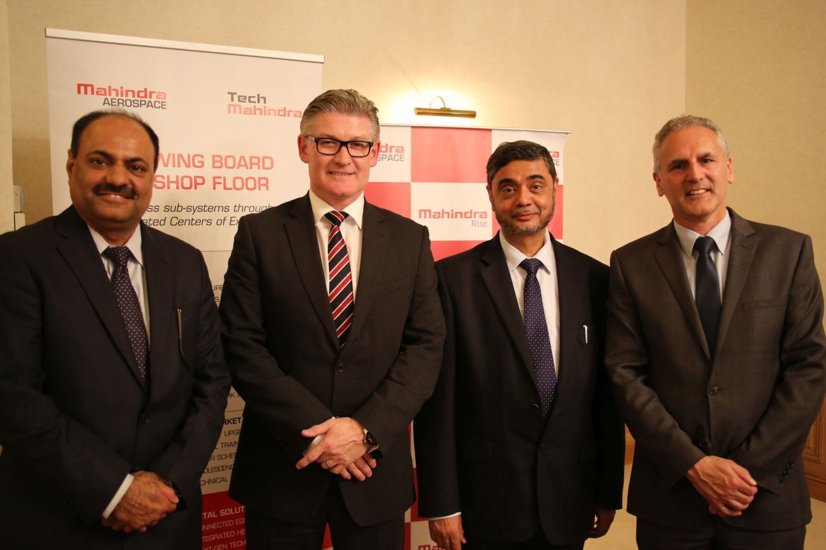 L-R: Arvind Mehra, Global CEO, Mahindra Aerospace; Frank Rainford, Executive Product Leader Aerostructures, GE Aviation Systems; S P Shukla, Chairman, Mahindra Aerospace; Stephen Roebuck, Director, Business Development, Mahindra Aerospace announced an agreement on complex parts and assemblies at Paris Air show 2015. (PRNewsFoto/Mahindra and Mahindra Limited)