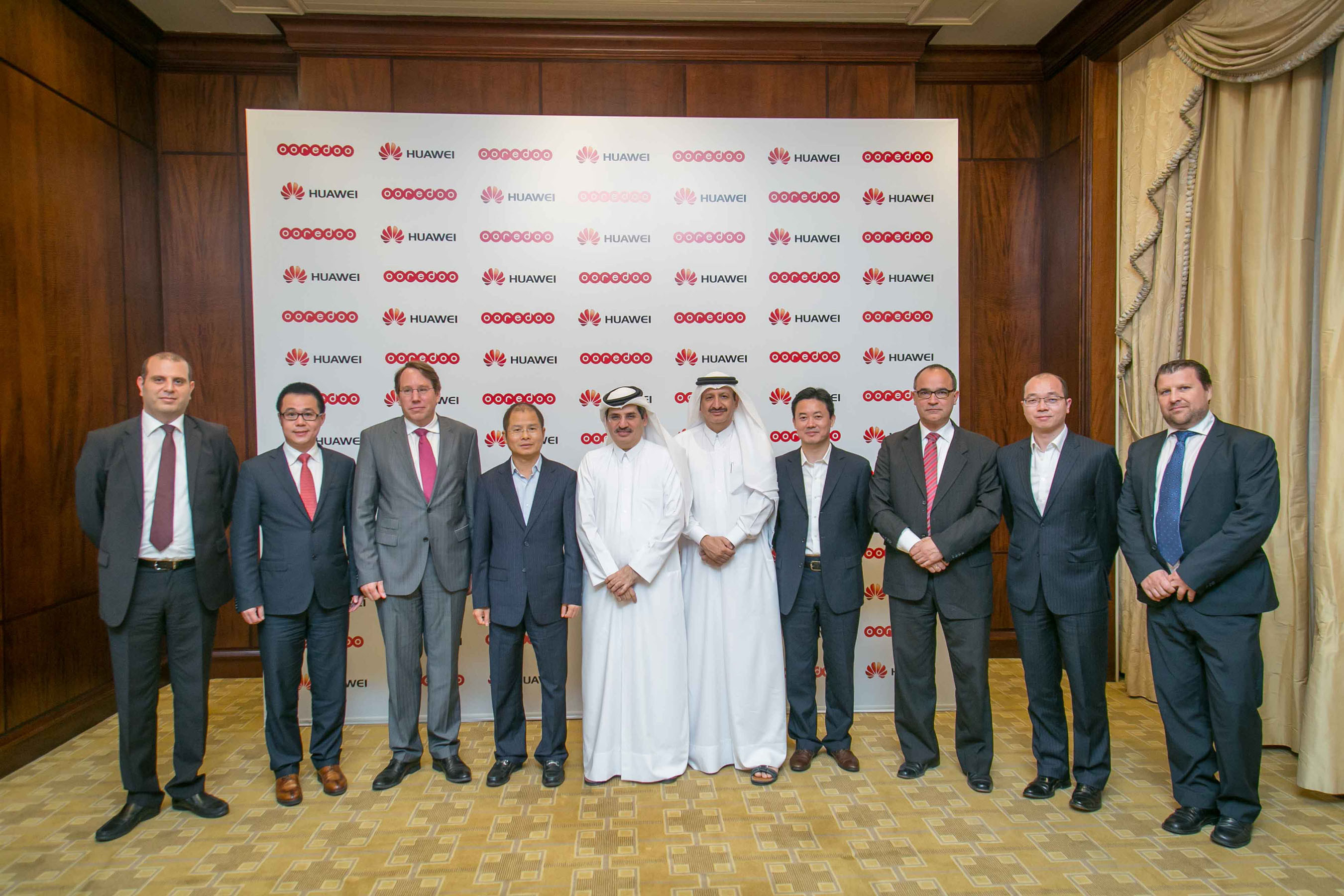 Senior Ooredoo and Huawei executives at the signing ceremony