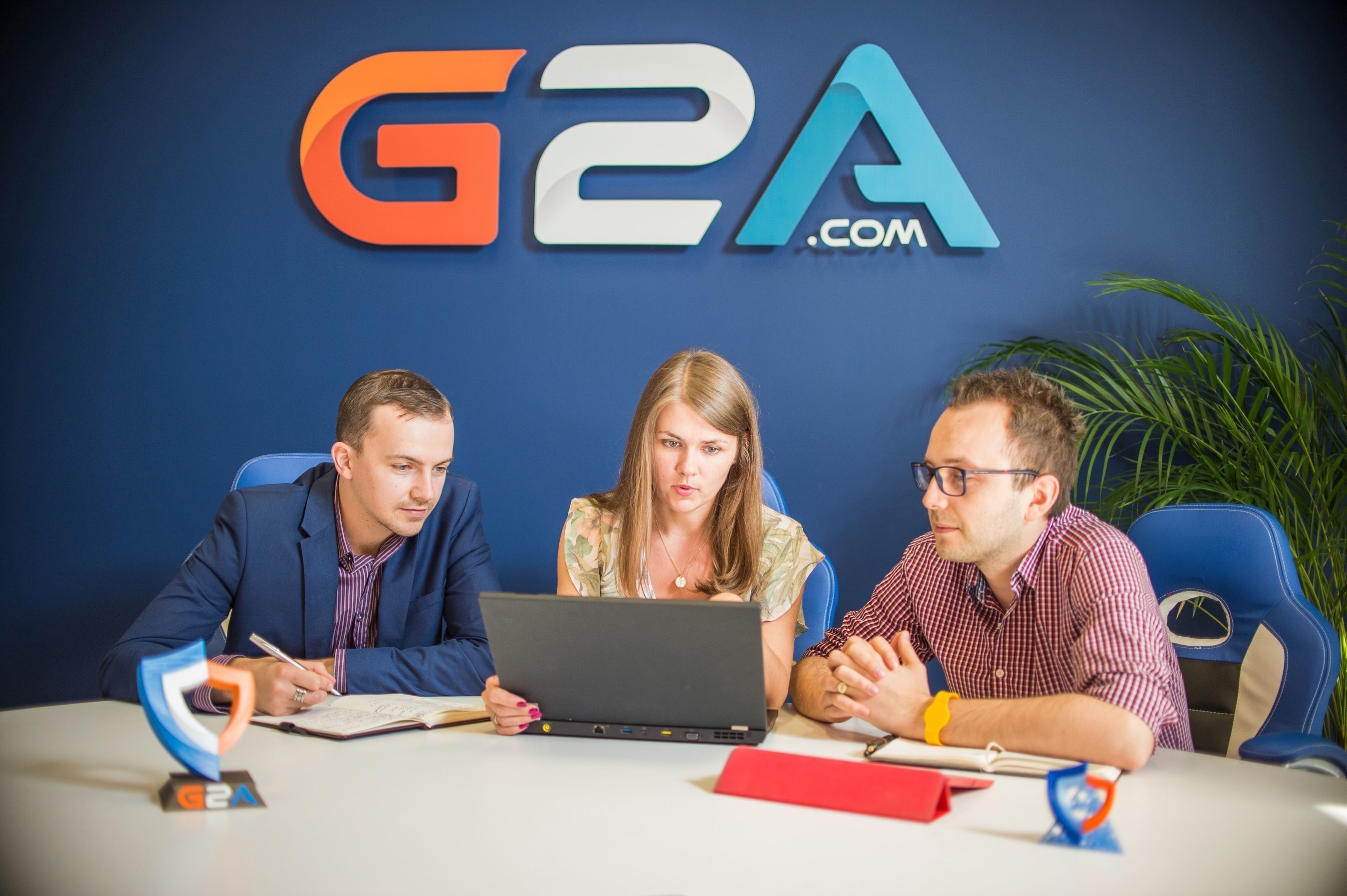 Part of the G2A Team finalizing the front-end verification steps for the G2A Marketplace to tighten security for new sellers. (PRNewsFoto/G2A.com)