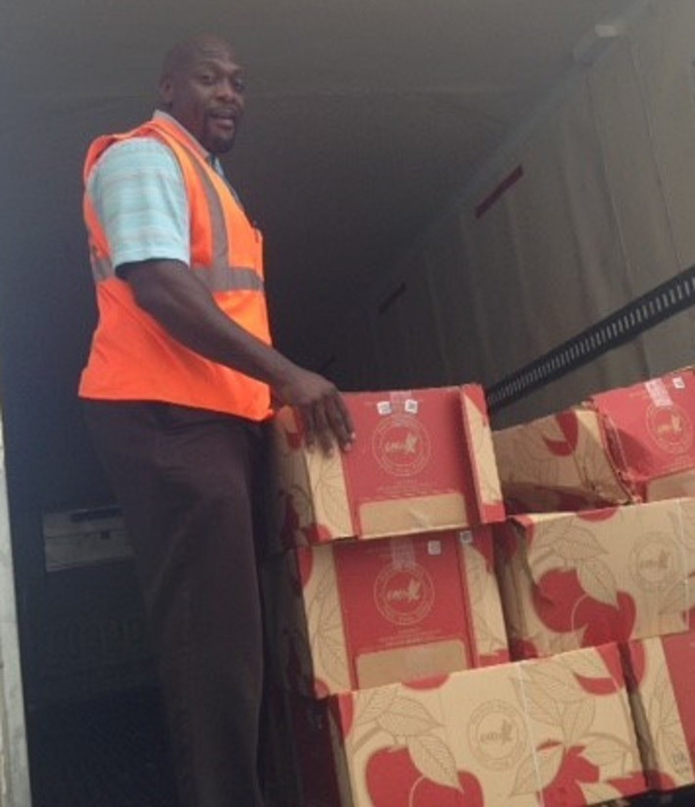 Jammie Bolton Unloading Apples He Donated At Food Bank In Chicago