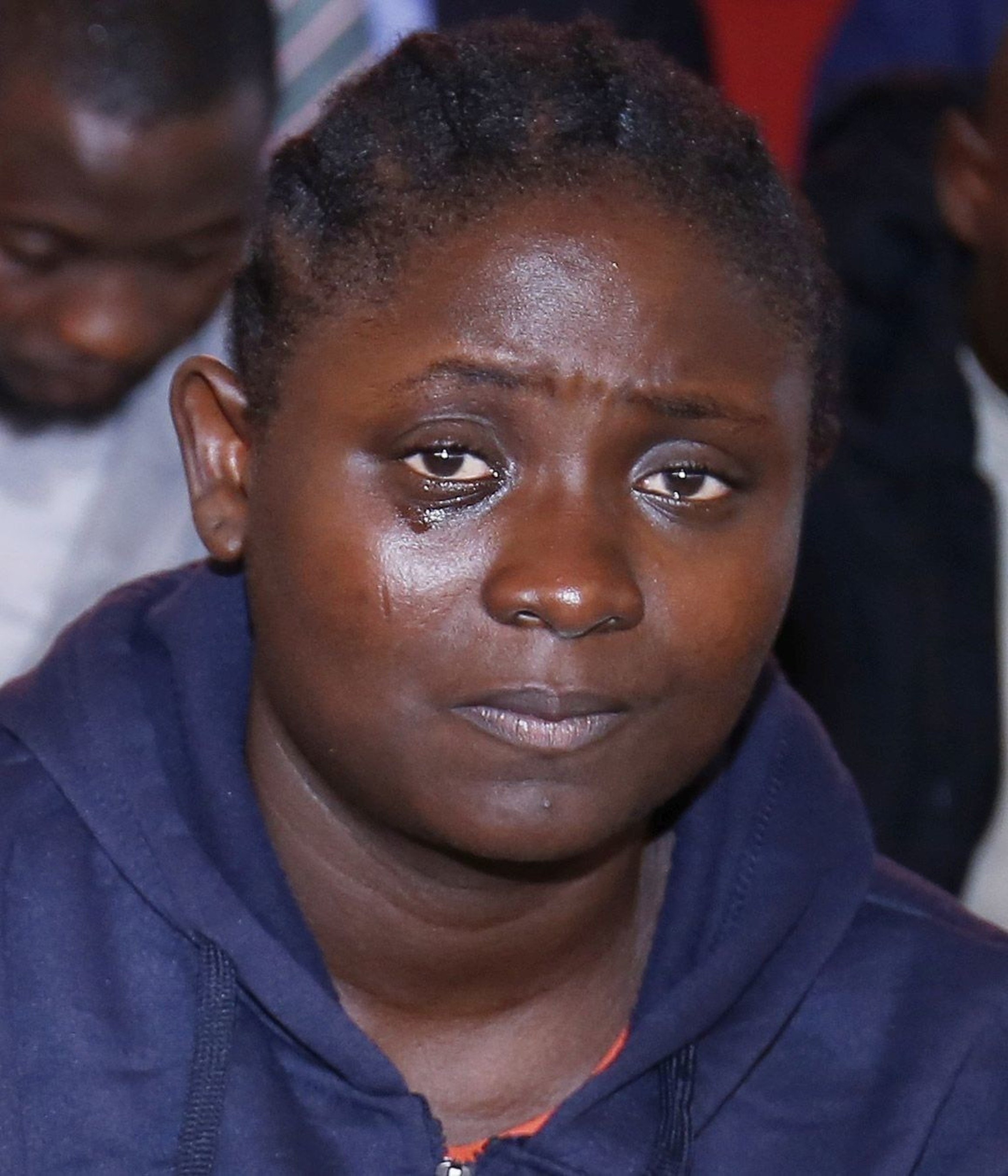One of the deportee's sheds tears after receiving her own portion of the N10,000,000 ($33,000) gift presented to the group after they came to The Synagogue, Church Of All Nations to seek refuge. They are the fourth group of deportees who have received help from the church in 2016. (PRNewsFoto/Emmanuel TV)