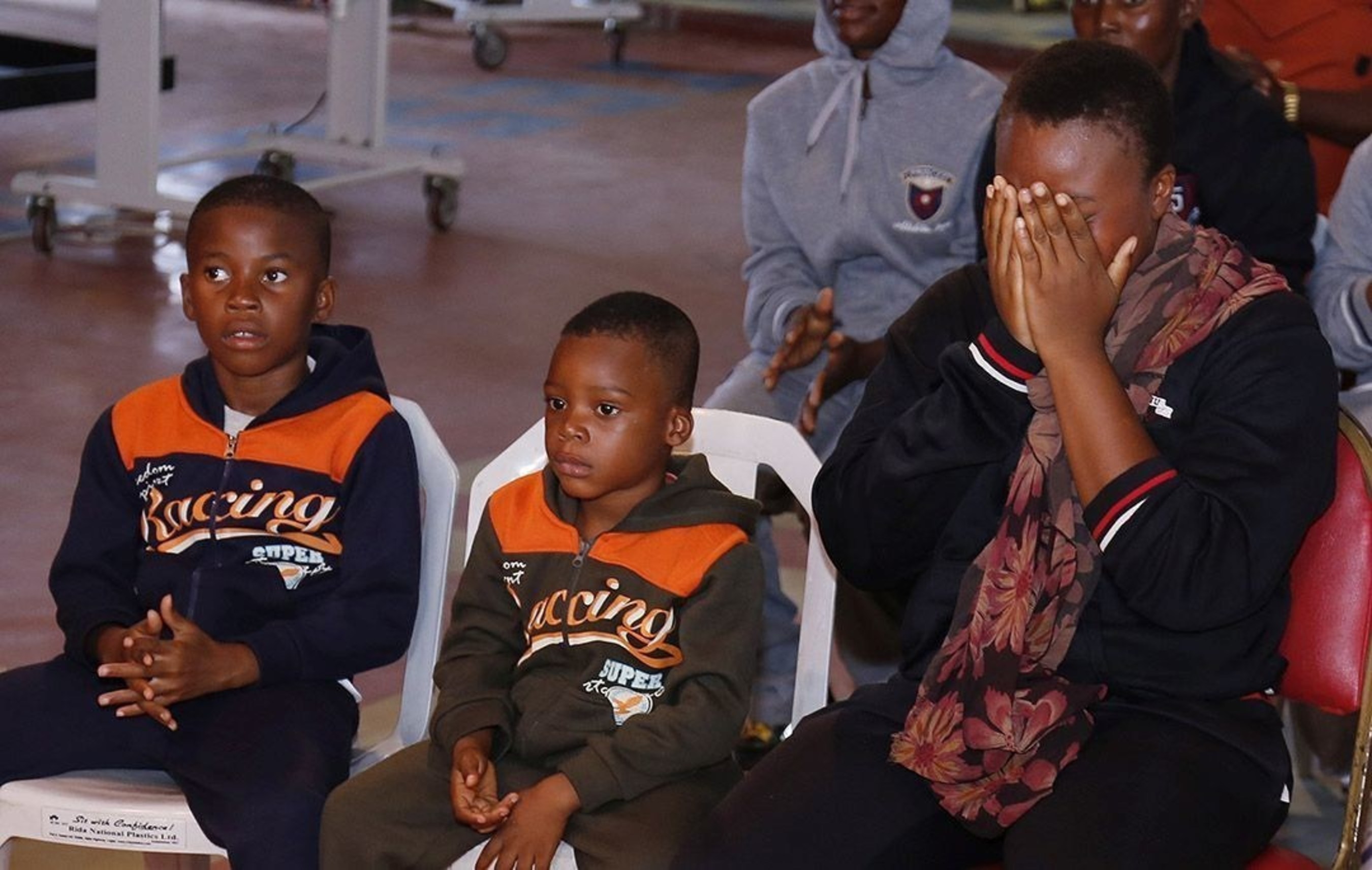 Precious Chioma cries as she recounts the ordeal she passed through with her two sons in their attempt to illegally travel to Europe from Nigeria. She sold all of her possessions to finance the trip but ended up in a Libyan prison after she was caught with her children hiding in suffocating conditions inside a watermelon truck. (PRNewsFoto/Emmanuel TV)