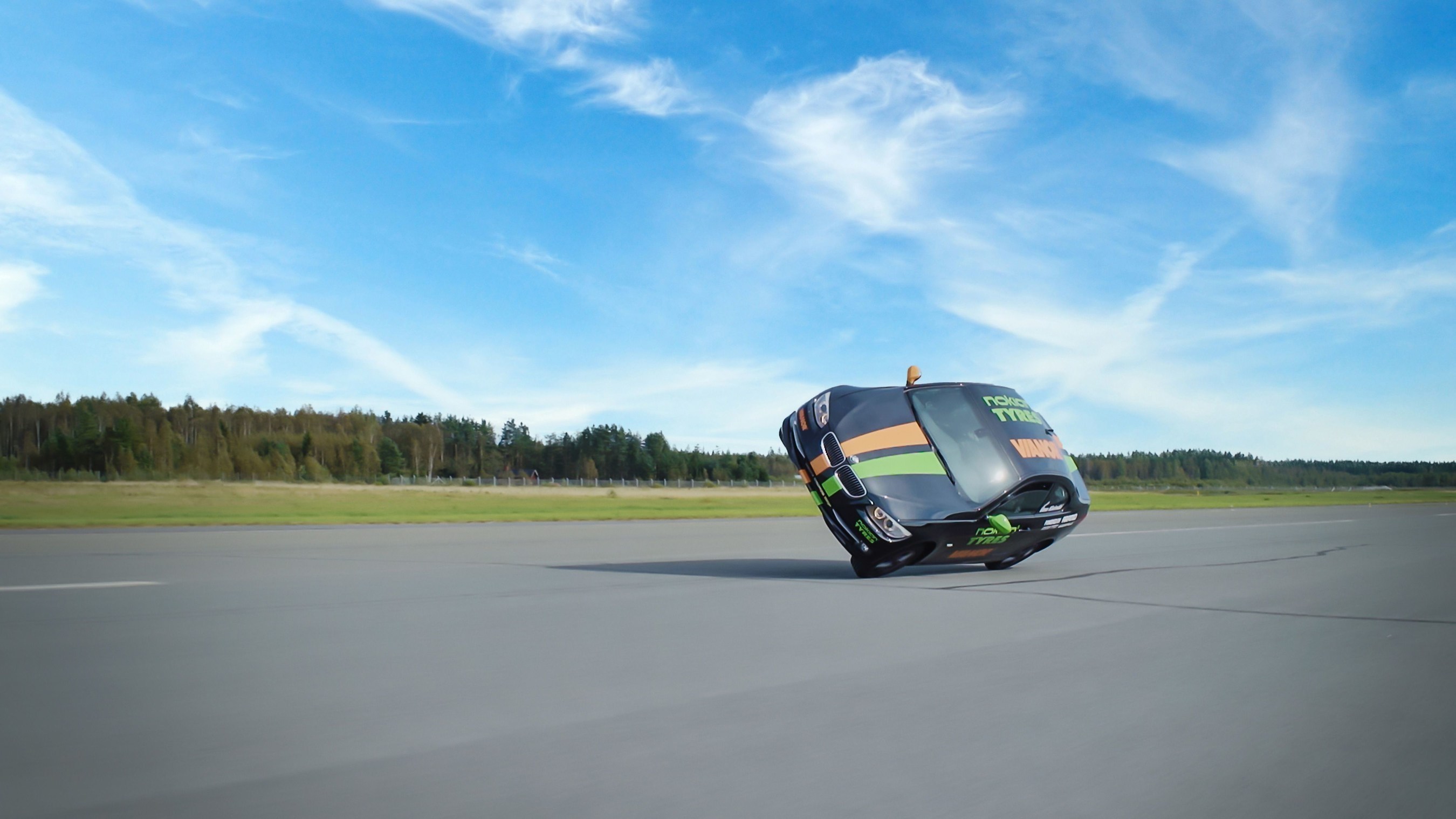 Nokian Tyres - Fastest side wheelie in a car. The new world record for Fastest side wheelie in a car was achieved by Nokian Tyres, when stunt driver Vesa Kivimäki drove at a speed of 186,269 kilometres per hour (115.742 mph). The tyres on the record-breaking car were reinforced with Nokian Tyres Aramid Sidewall technology. More: www.nokiantyres.com/fastestwheelie (PRNewsFoto/Nokian Tyres)