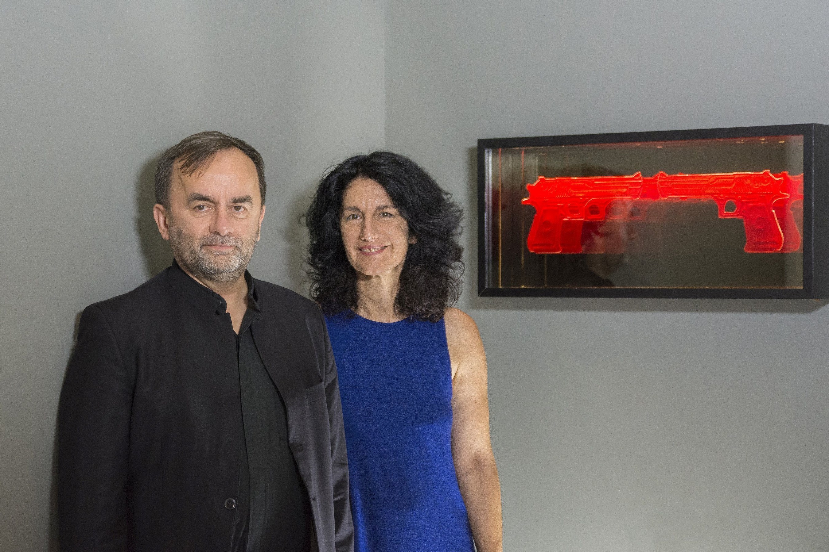 Mr. Patrick Desbois, president and founder of Yahad-In Unum, standing with Israel artist Mira Maylor, whose art is featured in the exhibit "Memory of the Holocaust Through Art," at the Museo de Holocausto, founded by Yahad-In Unum, in Guatemala.