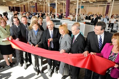 US Senator Jeanne Shaheen and NH Governor Maggie Hassan join Comcast officials to celebrate the grand opening of the company's newest call center in Hudson, NH.