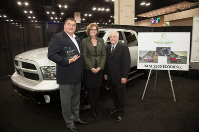 San Antonio Auto Dealers Association President Pam Crail and Green Car Journal Editor Ron Cogan present the 2015 Green Truck Award to Director, RAM Brand at Chrysler Robert Hegbloom for the RAM 1500 EcoDiesel