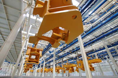 After coating by robots, components of XCMG's products are automatically transported to various assembly lines via conveyers