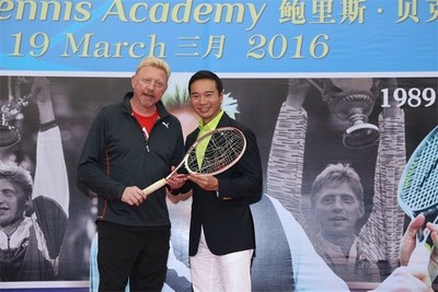 Tennis legend Boris Becker (left) gives the racket he won Wimbledon tournament in 1985 with to Mission Hills Vice Chairman Tenniel Chu during the press conference for the opening of Boris Becker Tennis Academy at Mission Hills Resor...<br /><br />Source : <a href=