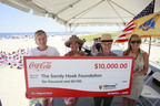 COCA-COLA AMERICA IS YOUR PARK  As part of Coca-Cola's America Is Your Park program, Linda Canzanelli, Superintendent of Gateway National Recreation Area, center right, and Betsy Barrett, President of the Sandy Hook Foundation, left, accept a $10,000 donation to Sandy Hook - Gateway National Recreation Area from Coca-Cola Refreshments' Dori Silverman, right, and New Jersey Division of Travel & Tourism's Phyllis Oppenheimer, center left, on behalf of New Jersey Lt. Governor Kim Guadagno, at Sandy Hook, N.J., Wednesday, July 27, 2011. (Stuart Ramson/Insider Images for Coca-Cola) (PRNewsFoto/Coca-Cola) NEW YORK, NY UNITED STATES 