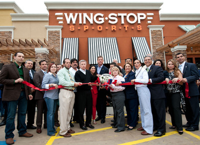 Troy Aikman Helps Wingstop Sports Celebrate Grand Opening in Brownsville