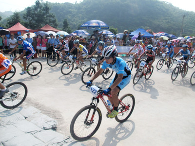 Fuquan County, Guizhou Province: Mountain Bike League Players Fighting in Pear Garden