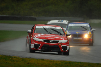 Andy Lally Pilots DonorsChoose.org/Infinity Audio Kia Forte Koup To Thrilling Second Place Finish At Lime Rock Park In 2012 Grand-Am Season Finale