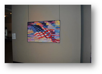 Evocative Quilt Depiction of Embattled American Flag Moves Visitors of The National Quilt Museum