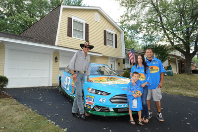 Richard Petty Hands Over Keys for a Mortgage Free House to Illinois Military Family