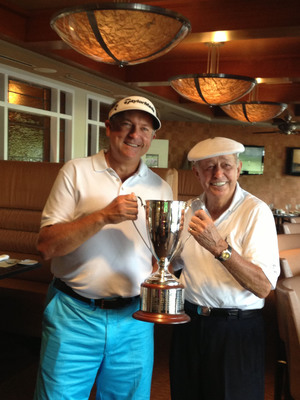 Ken Duke Surprises Coach Bob Toski with Championship Trophy at St. Andrews Country Club