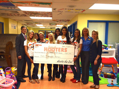 Hooters of Fort Lauderdale and Miss Hooters International 2013 Present a $10,000 Check to the Joe DiMaggio Children's Hospital
