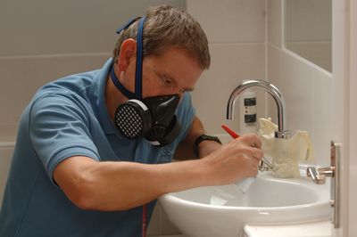 Hilton Hotel Bathrooms Renovated by Plastic Surgeon